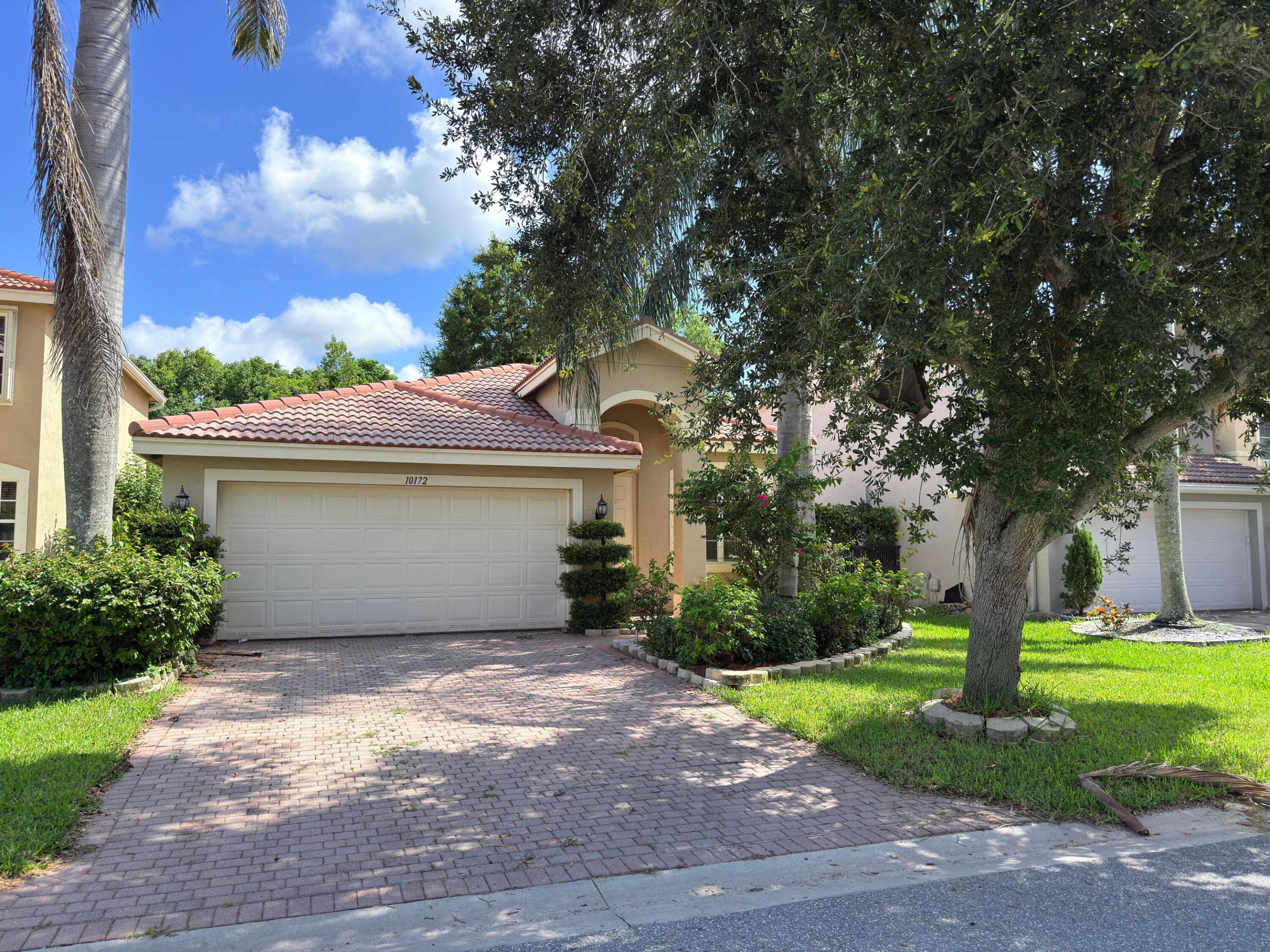 Welcome to the highly sought-after Greystone community, one of Boynton Beach's premier gated neighborhoods known for its beautifully maintained landscaping, scenic lakes, and outstanding resort-style amenities. Residents enjoy access to a clubhouse, fitness center, swimming pool, tennis and basketball courts, playgrounds, walking paths, and an active community atmosphere that makes Greystone one of the area's most desirable places to call home.  This 3-bedroom, 2-bath home offers a fantastic opportunity for buyers looking to personalize a property to their own taste. While the home could benefit from new flooring and fresh paint, it provides a solid foundation in an exceptional location with tremendous potential.   Ideally situated near top-rated Palm Beach County schools, Canyon Town Center, shopping, restaurants, parks, and everyday conveniences, Greystone also offers easy access to Florida's Turnpike, I-95, and nearby beaches, making commuting and enjoying the South Florida lifestyle effortless.  This property is eligible under the First Look Initiative which expires after 30 full days on market. No investor offers until first look period expires.  No offers regardless of buyer type will not be negotiated within the first 7 days of listing.