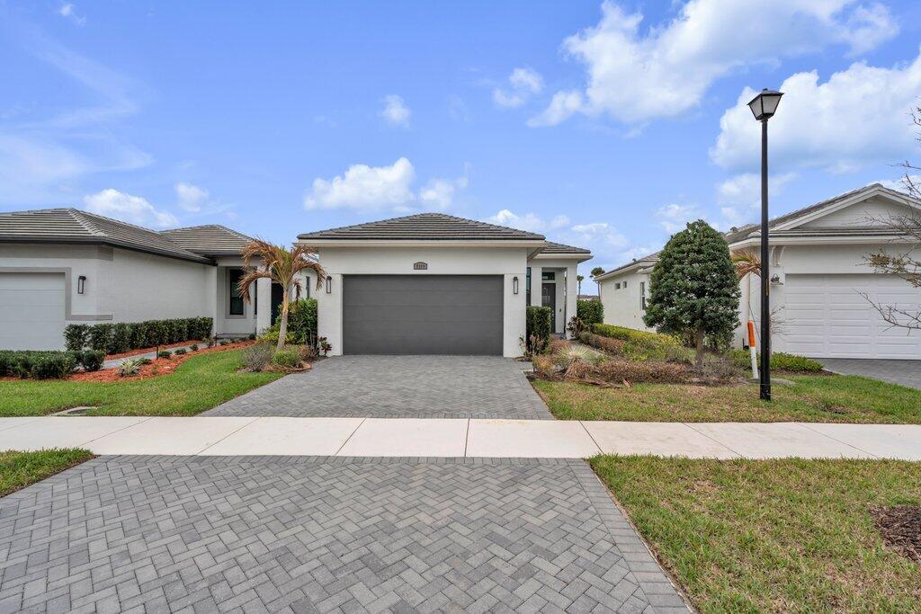Better than new and packed with upgrades! Why wait to build when you can own this move-in ready home with features that would cost significantly more in new construction? This beautifully upgraded home includes premium cabinets and countertops, all tile flooring throughout, upgraded interior paint, stylish kitchen lighting, ceiling fans, TV mounts, and additional designer touches throughout. Enjoy the value of a fully finished, upgraded home without the extra costs and wait of new construction!