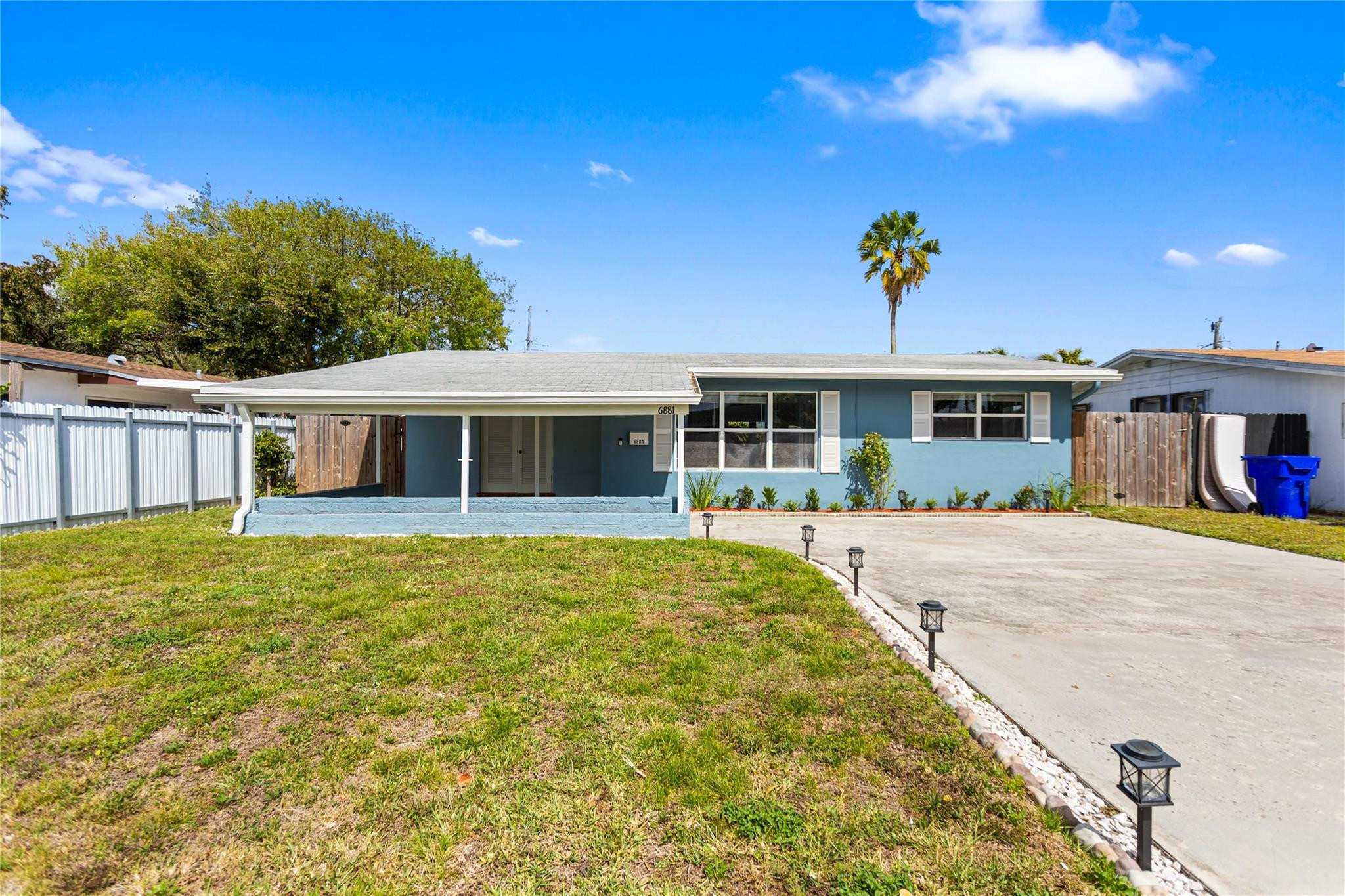 Welcome to this adorable, cozy 3BR/2BA in the heart of Hollywood. Inside, you’ll find a beautifully updated kitchen, with brand-new appliances, granite countertops, new Undermount sink and glass tile backsplash, and a brand new washing machine in the laundry room. Ceramic tile flooring is installed throughout the main living, dining and kitchen areas, with laminate in the master bedroom and newer carpet in the other bedrooms. Bathrooms have been  updated. This property has a 2024 AC , 2018 roof, 2021 W/H and PGT impact windows. Plumbing/electrical are up to code.  All interior doors were just replaced, and the exterior was freshly painted. Property is on a well maintained Septic. Beautiful spacious backyard. Walking distance to both the elementary & middle schools. Furniture is optional.