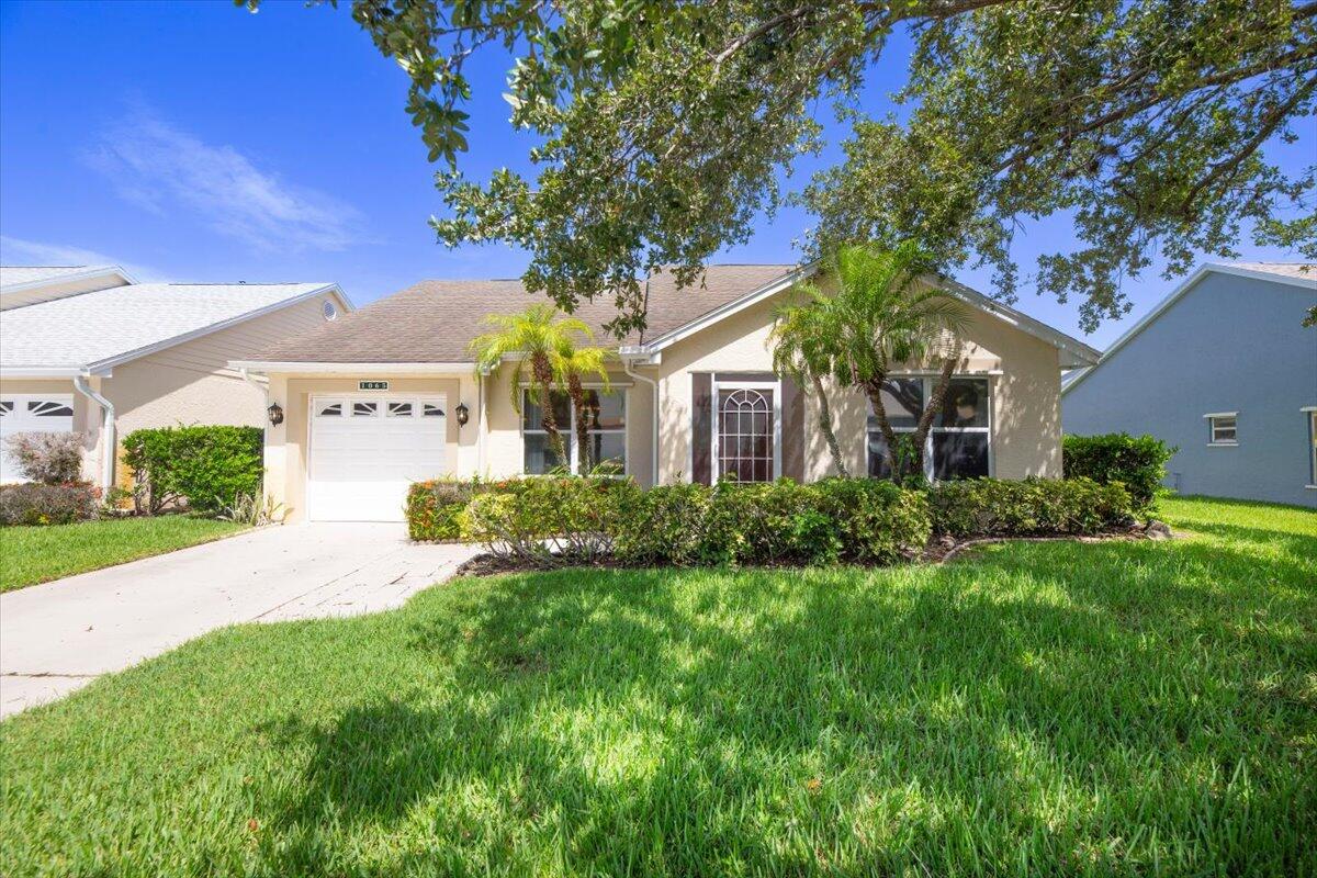 Welcome to Kings Isle, one of Pt St Lucie's most desired, active 55+ lifestyle communities!  This 2/2/1 features an open concept kitchen & family room, with separate dining room & living room. Kitchen has water filtration system. Split floor plan offers ultimate privacy The screened-in patio with open-and-close vinyl windows keep you comfy and cozy during any season! Attached exterior CBS storage room provides all the space you need for extras. Kings Isle provides Clubhouse, Pool, Pickleball, Ballroom, Arts & Crafts Room, Billiards and much, much more! Ample guest parking. Fees include House Painting. Convenient location close to Restaurants, Shopping, City Events, Medical Offices and the St Lucie Mets Stadium! Total fees $472 per month. Capital Contribution $1,118 one time. $225 + $50 per adult Application Fee. Barcode & ID fees due at new buyer registration, $17-32. Monthly Fees include Clubhouse, Pool, Amenities, Landscaping, Irrigation, Streets, Gatehouse, Common Areas, Cable & Internet & house painting.