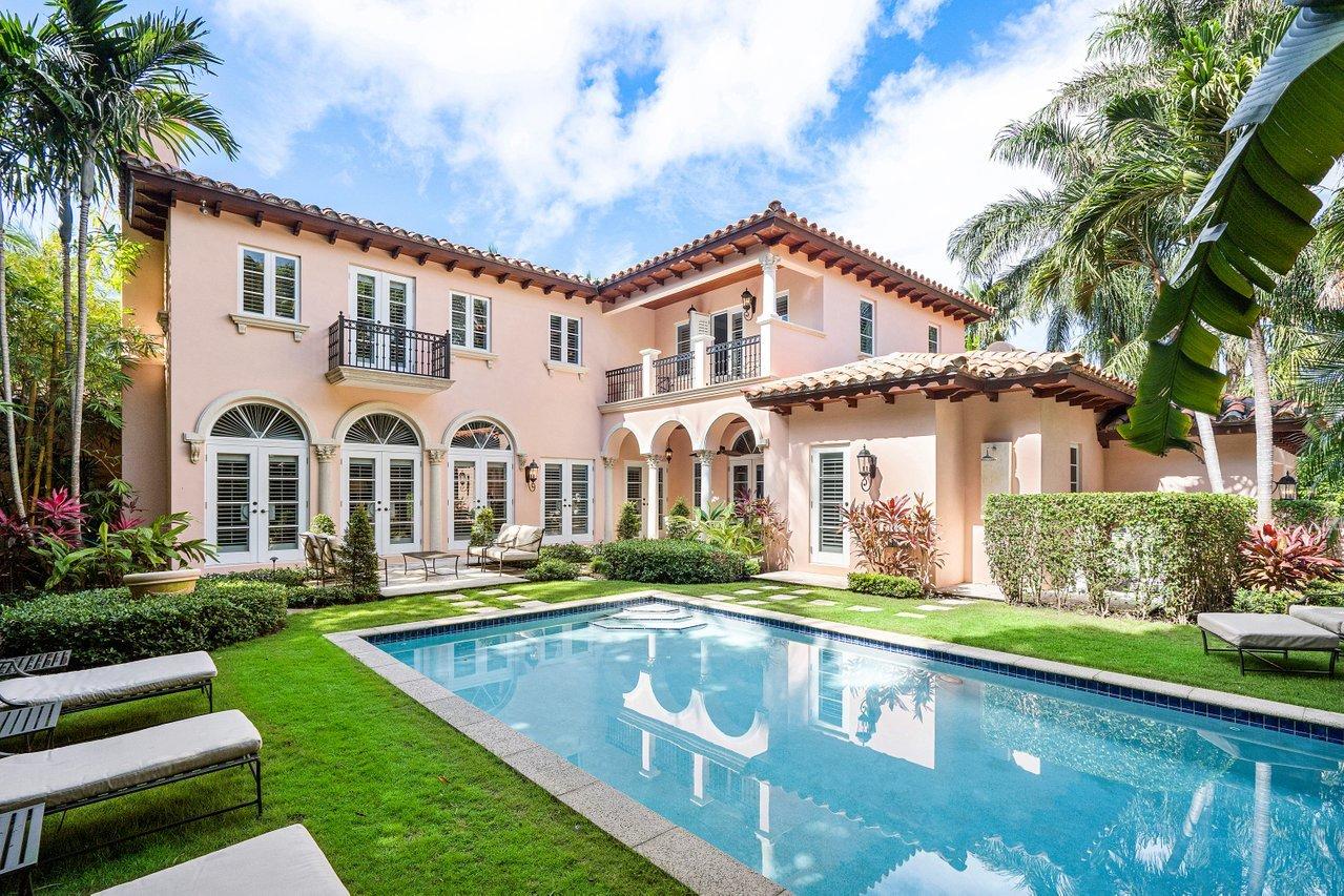 This Impeccable In-Town 2 Story Mediterranean Custom Home was Built in 2009. It offers extraordinary workmanship and attention to every detail including hurricane impact doors and windows. Inside there are volume ceilings, beautiful mill work and Jerusalem Stone floors that flow through the main living areas. Upstairs are hardwood floors leading to the gorgeous  Master Suite that  has his and hers baths and 2 walk-in closets. There are 3 Guest Bedrooms all en-suite, a Library, Office/Gym Family Room, Gourmet Kitchen, Formal Dining Room, Living Room and Elevator. There is a W/D on each floor and  2 Car Garage with AC. The pool area is surrounded by lush landscaping and manicured grounds. This spectacular home is ideally located just blocks to shops, restaurants, beaches and the Lake Trail