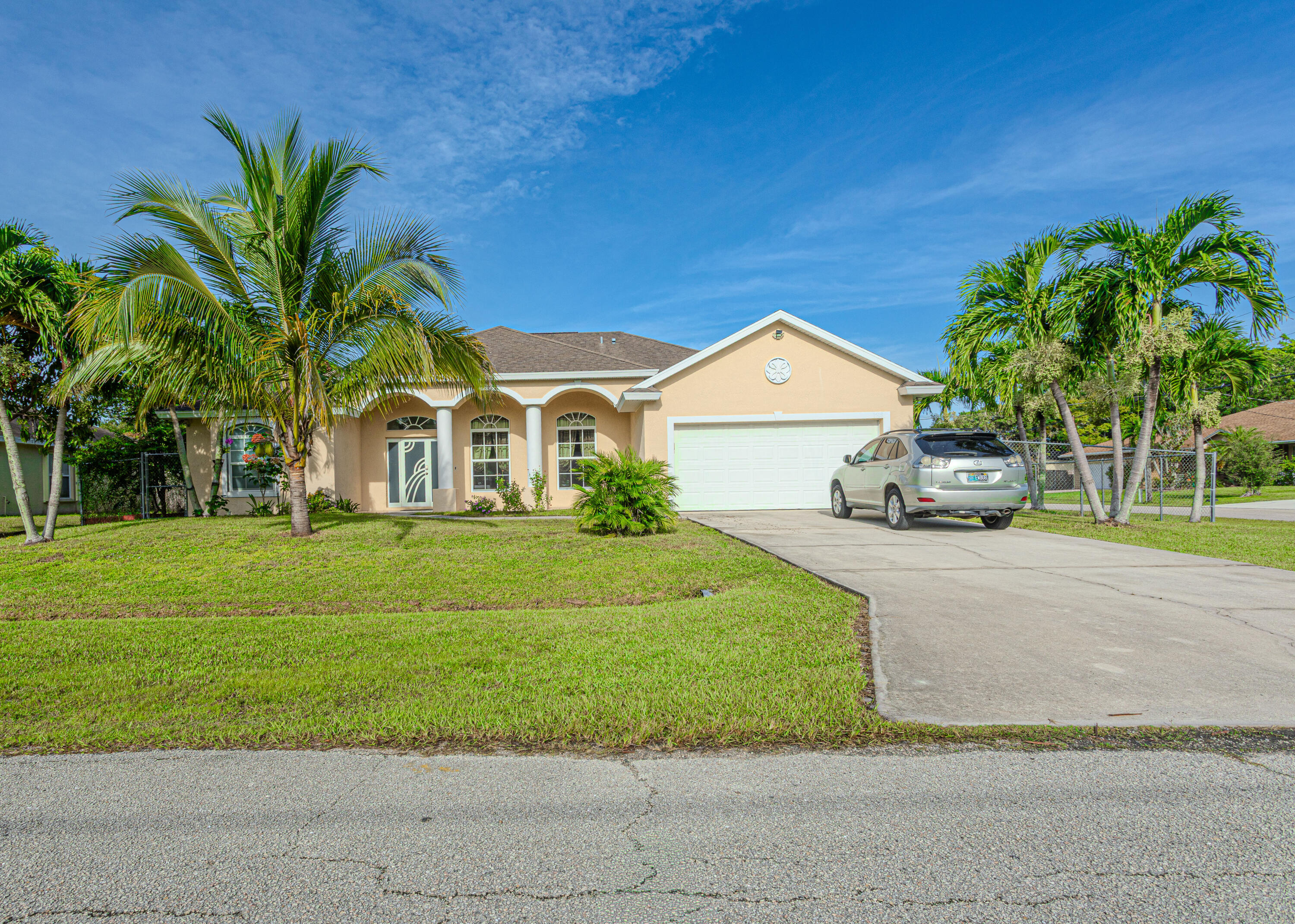 This well-maintained corner lot home is perfect for your family, 4/3. It features two master bedrooms, a completely fenced backyard, and fruit trees. Very nice and quiet neighborhood. The entire house has a water filter. The front of the house has impact glass. A metal shed is included, 12x20. Close to the turnpike and I-95. The pictures don't do the house justice, so come see this gem and fall in love with it!