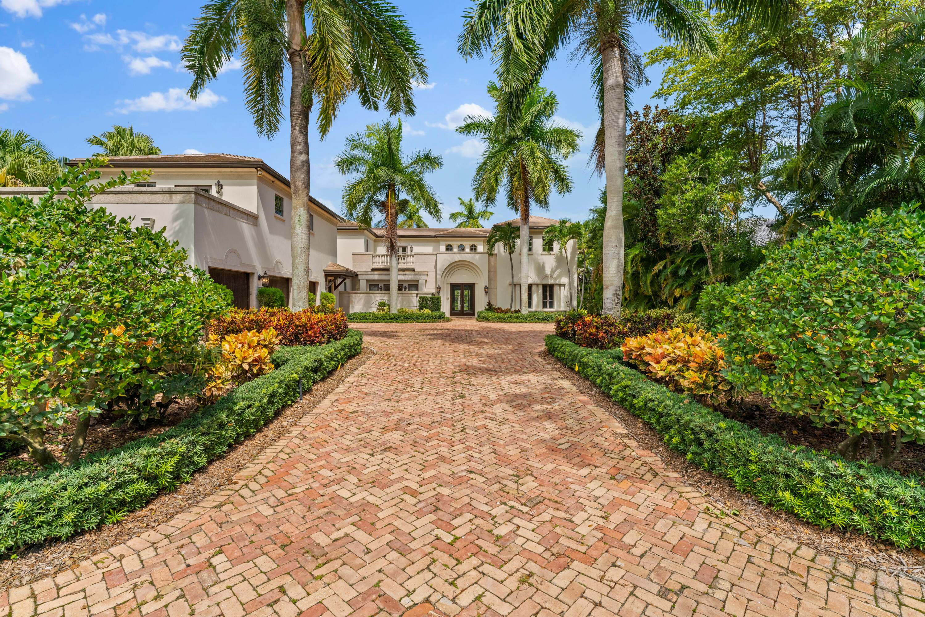 Paradise Found !!!! In this Waterfront Estate Home. A must see property for anyone looking to buy in Admirals Cove Golf & Country Club.  Located five lots from the Intracoastal Waterway with a new Boat Dock for your Yacht Storage. This house has an endless list of upgrades and improvements. Including but not limited to, Impact Glass doors and windows, separate Sub-Zero Feezer/Refridgerator, Elevator, New Back-Up Generator, Elise Gas Oven/5 Burners, French Doors, A Fire Pit, Guest Suit, 2-Bosch Dish Washers, 2-Ice Makers, A New Double-Oven, 100% Artificial Turf Grounds, Mature Palm Trees and Landscaping, 2 Beverage Coolers, Summer Kitchen, Pool/Spa and Putting Green with Belly Bunker. Custom craftsmanship and high-end materials throughout this Grand Estate. Don't miss this opportunity...