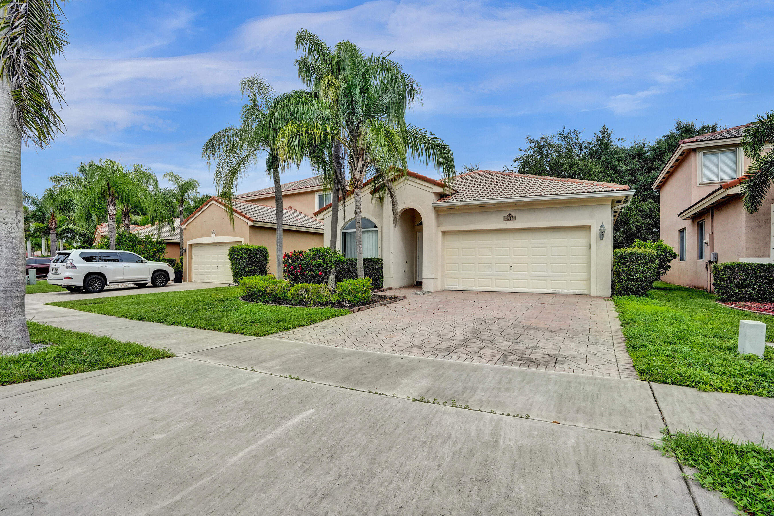 Beautiful one-story home located in one of Coconut Creek's premier communities, nestled on a peaceful cul-de sac. Enjoy the convenience of walking to nearby schools, parks, and the community pool. The home has been freshly painted and features a modern kitchen with granite countertops and a stunning backsplash. Step outside to a spacious, fenced-in backyard with fruit trees and a screened porch—perfect for relaxing or entertaining. This home is a must-see! Please note, HOA requires a credit score of 650 or higher.