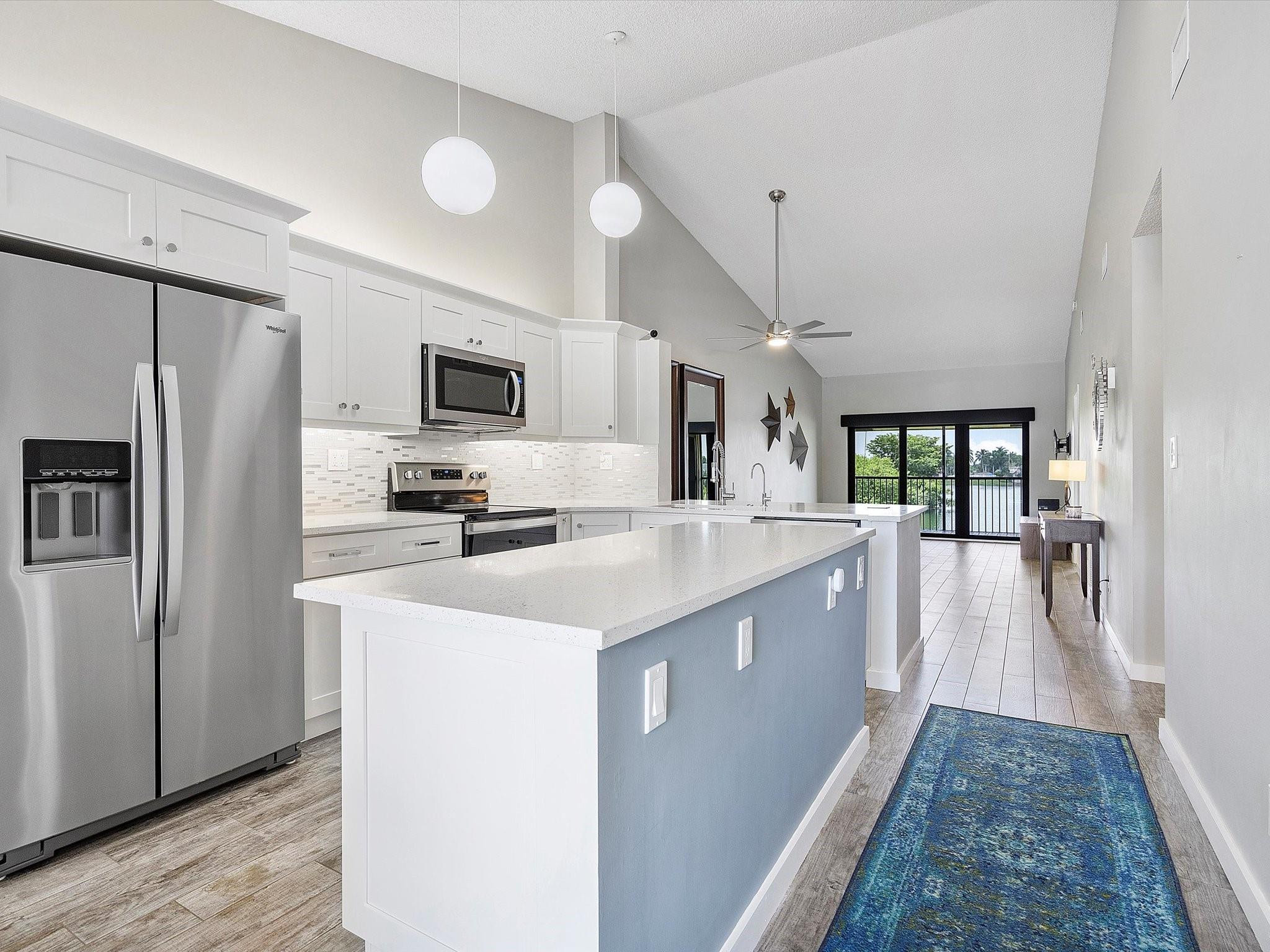 Beautifully renovated top-floor condo with serene lake views in the secluded community of Mira Lago, just south of Commercial Blvd. Centrally located with easy highway access while still offering a quiet, tucked-away setting. Features include hurricane impact windows facing the lake, electric blinds in living room and bedroom, a spacious walk-in shower with rain head, and a custom walk-in closet. The open-concept kitchen and living area showcase quality finishes and craftsmanship throughout. Major community upgrades have been completed, including new roof, painting and concrete restoration is in progress. Budget and Insurance Declaration Page attached.