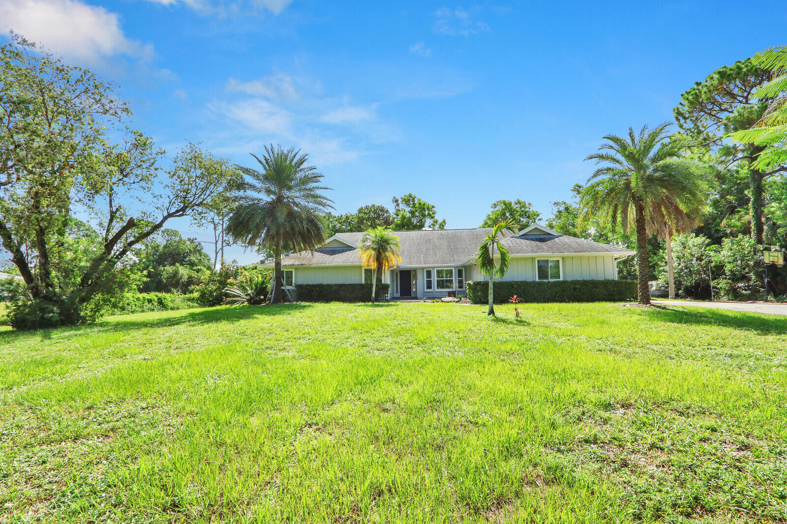 New Listing! Well-maintained 3-bedroom, 2-bath home on over an acre of land with an open floor plan and high ceilings that create a bright, spacious feel. Enjoy the in-ground pool, garage, and versatile yard with plenty of room for a boat, RV, trailers, and additional parking. Pets allowed. (check with courty/city on limits and types) Recent updates include a new water system, well pump, bedroom-zone A/C, dishwasher, kitchen faucet, garbage disposal, and water heater. Move-in ready with the space and flexibility you've been looking for!
