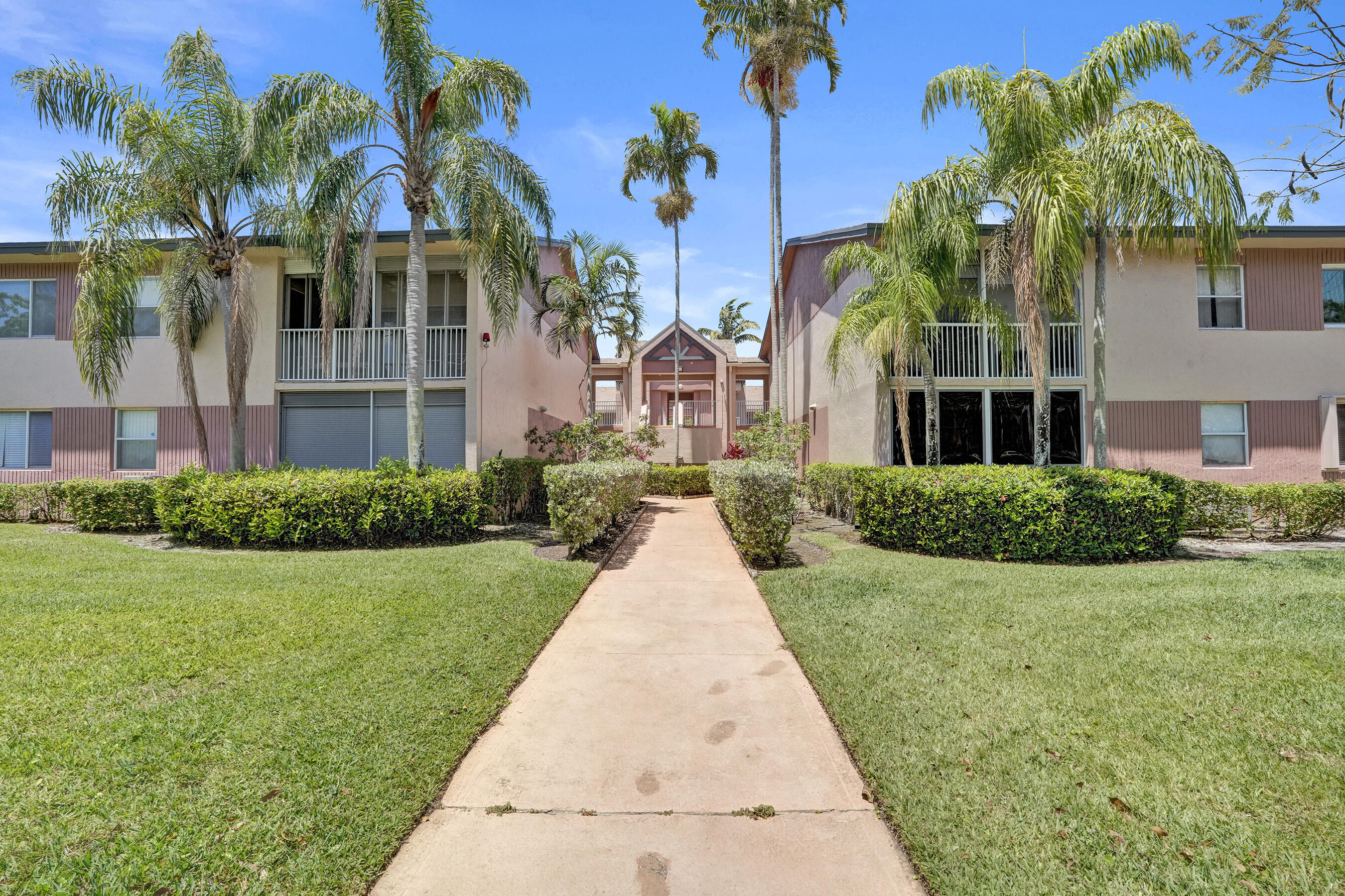 Lovely corner 2 Bed/ 2 Bath water views in the highly sought after Kings Point community. This spacious residence features vaulted ceilings, an open floor plan, and lots natural light. Enjoy two private screened in patios perfect for relaxing outdoors, plus a larger patio with a convenient storage closet and tranquil water views. The oversized eat-in kitchen offers plenty of space for dining and entertaining. Additional features include a walk-in closet, in-unit washer and dryer, and elevator building access. Kings Point is an active 55+ community offering resort-style amenities including a 60,000 sq. ft. clubhouse, 1,000-seat theater, multiple pools, fitness center, billiards, hobby rooms, tennis courts, pickleball, ping pong, shuffleboard, and courtesy bus service to shopping and more.