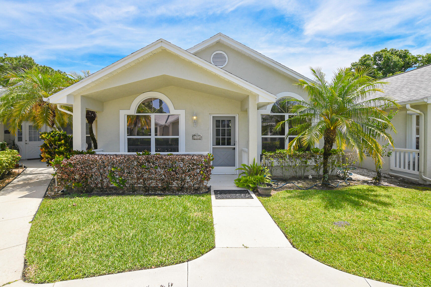 Move-in ready 2/2 Jasmine Villa in a charming courtyard setting in the Isle of Lombardy at Kings Isle, a 55+ gated community. This well-maintained home features a covered carport, a screened patio perfect for relaxing, a 2022 roof and A/C, newer appliances (2024), and new carpet in the bedrooms. Spacious laundry/utility room with ample extra storage space. Enjoy low-maintenance living and an active lifestyle with resort-style amenities, including clubhouse, pool, fitness center, tennis, pickleball, and a full calendar of social activities. Conveniently located within walking distance to the clubhouse. Near shopping, dining, medical facilities, and entertainment.
