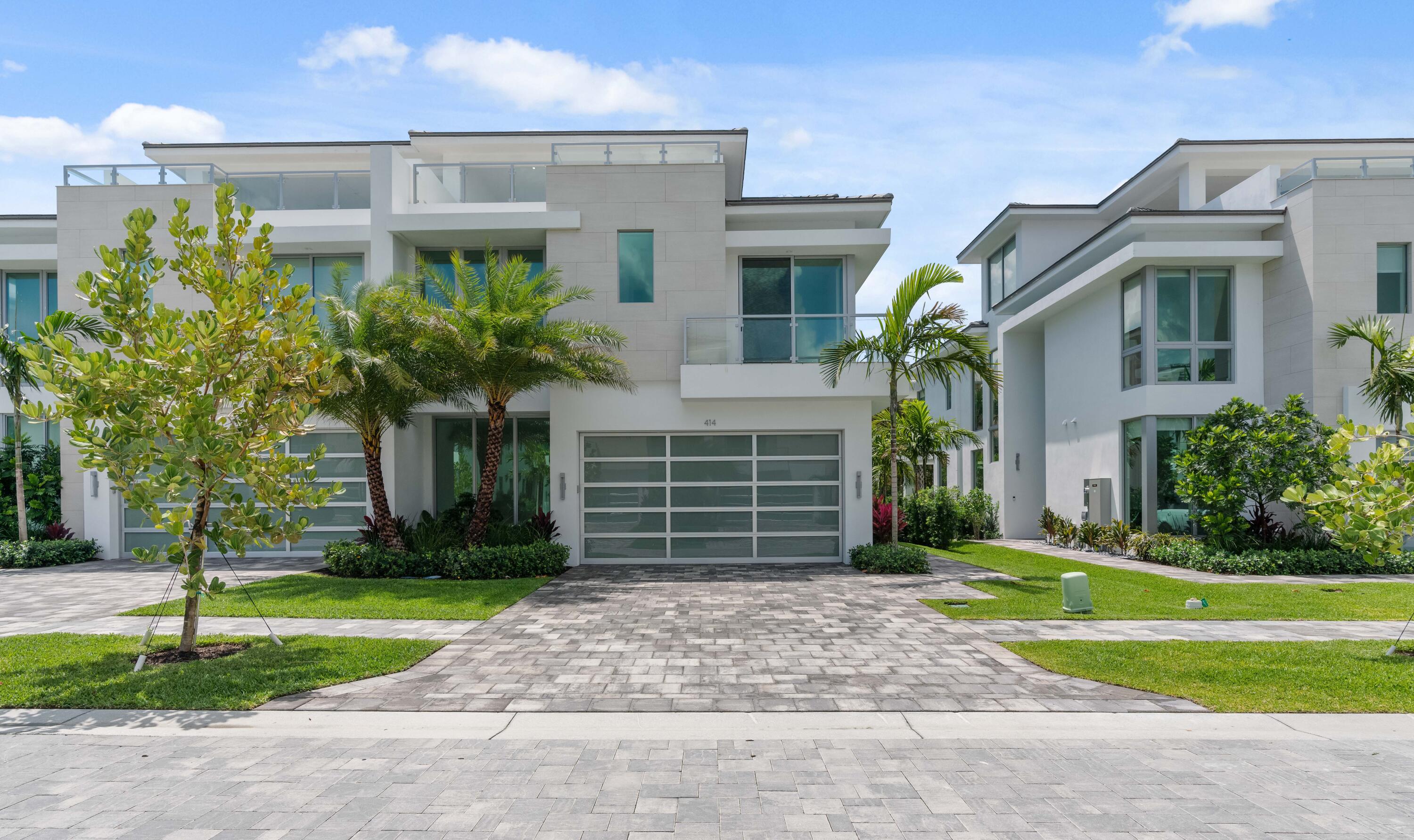Juno Beach living perfected! Feel the tropical sea breezes from this stunning contemporary-style luxury residence just 400 yards from the Atlantic Ocean with 3rd-floor ocean views. The floor plan was designed to inspire modern living and entertaining with expansive spaces bathed in an abundance of natural light. Highly curated designer features and finishes include 10' ceilings, porcelain tile flooring, solid core doors, quartz countertops, a high-end appliance package, a private elevator, and tiered glass panel balconies. The expansive owner's retreat includes a ''celebrity style'' wardrobe, a spa-like master bath with his and her vanities, under-mounted sinks, and extended vanity mirrors. Guest bedrooms offer the luxury of both walk-in closets and graciously sized private baths. Additional features include; a fully landscaped lot, a covered patio with a built-in Twin Eagles barbecue, a custom pool/spa, impact glass, a whole-house generator, electric car ports and much more! In addition, residents of Ocean One will enjoy the small town "walk and bike to the sea" lifestyle and proximity to sophisticated dining, cultural arts, shopping, world-class golf, and boating.
