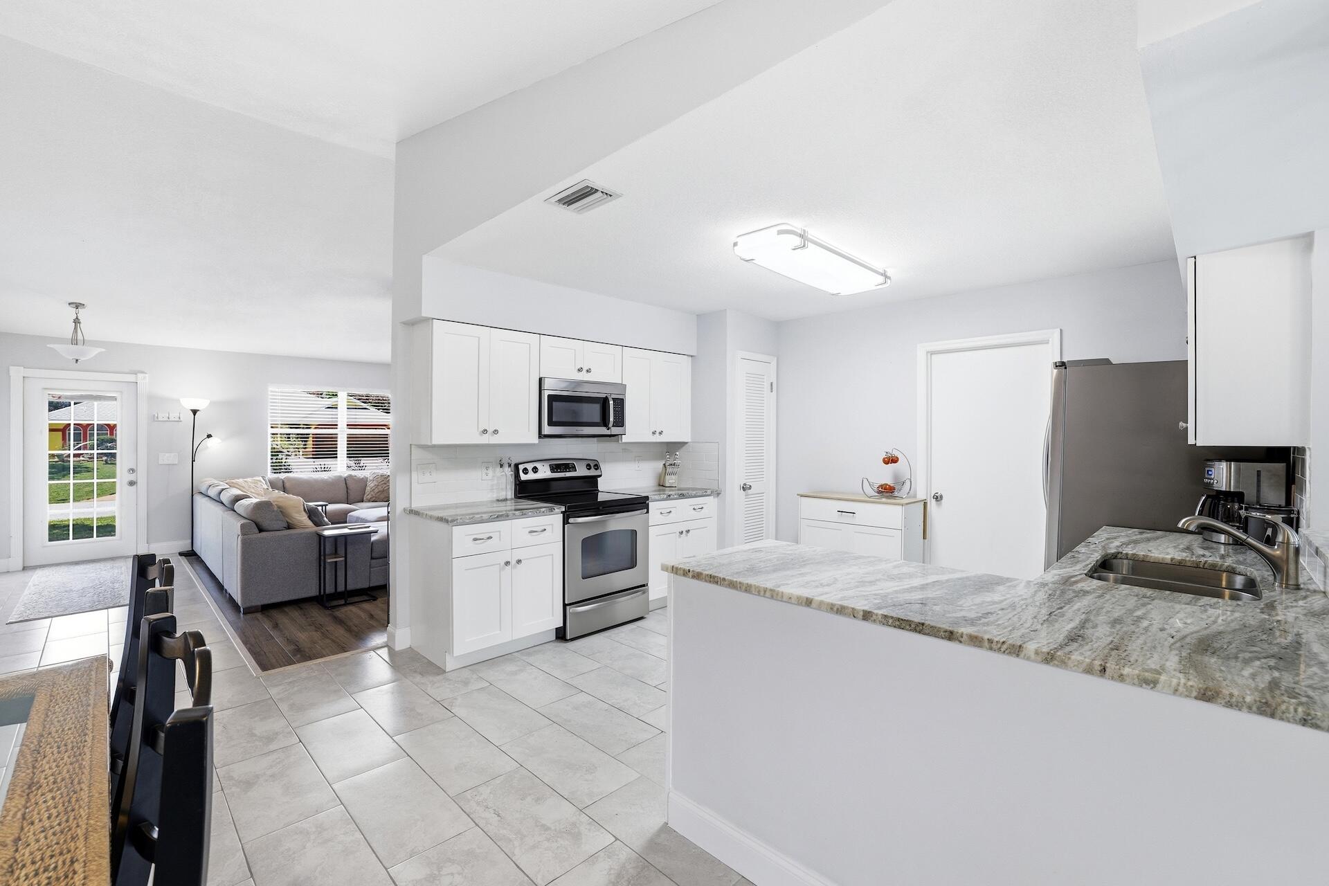 Looking for a cute, renovated 2 bed/2 bath, with no HOA, a large fenced yard on 1/3 acre corner lot, and a BRAND NEW ROOF?  Look no further.... This spacious layout also offers a bonus area that perfect for a game area, home office or second living area.  The oversized laundry room provides extra space for additional storage. The home is centrally located and close to interstates, beaches, shops and restaurants.
