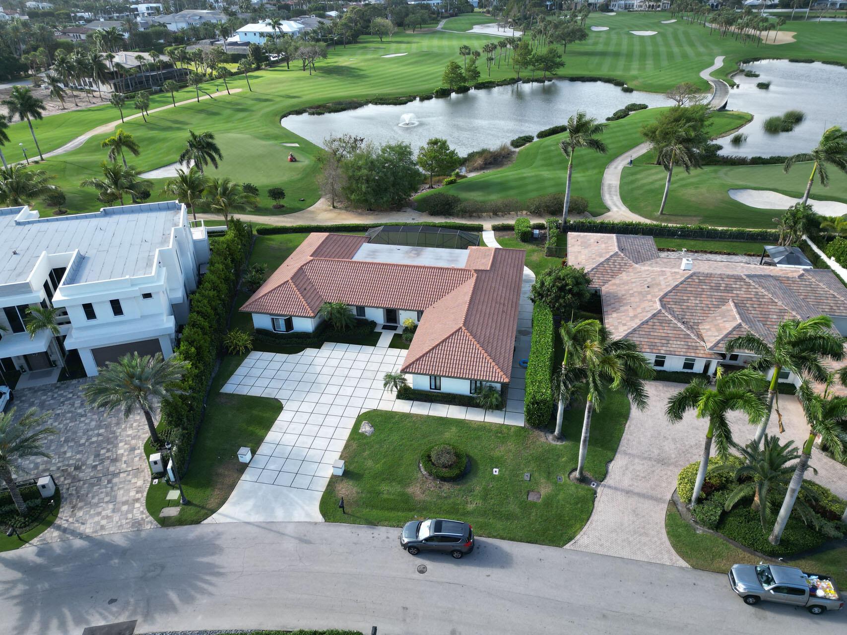 Golf course property with 132' of golf course frontage in Royal Palm Yacht & Country Club with southeast exposure. Property being sold as-is.