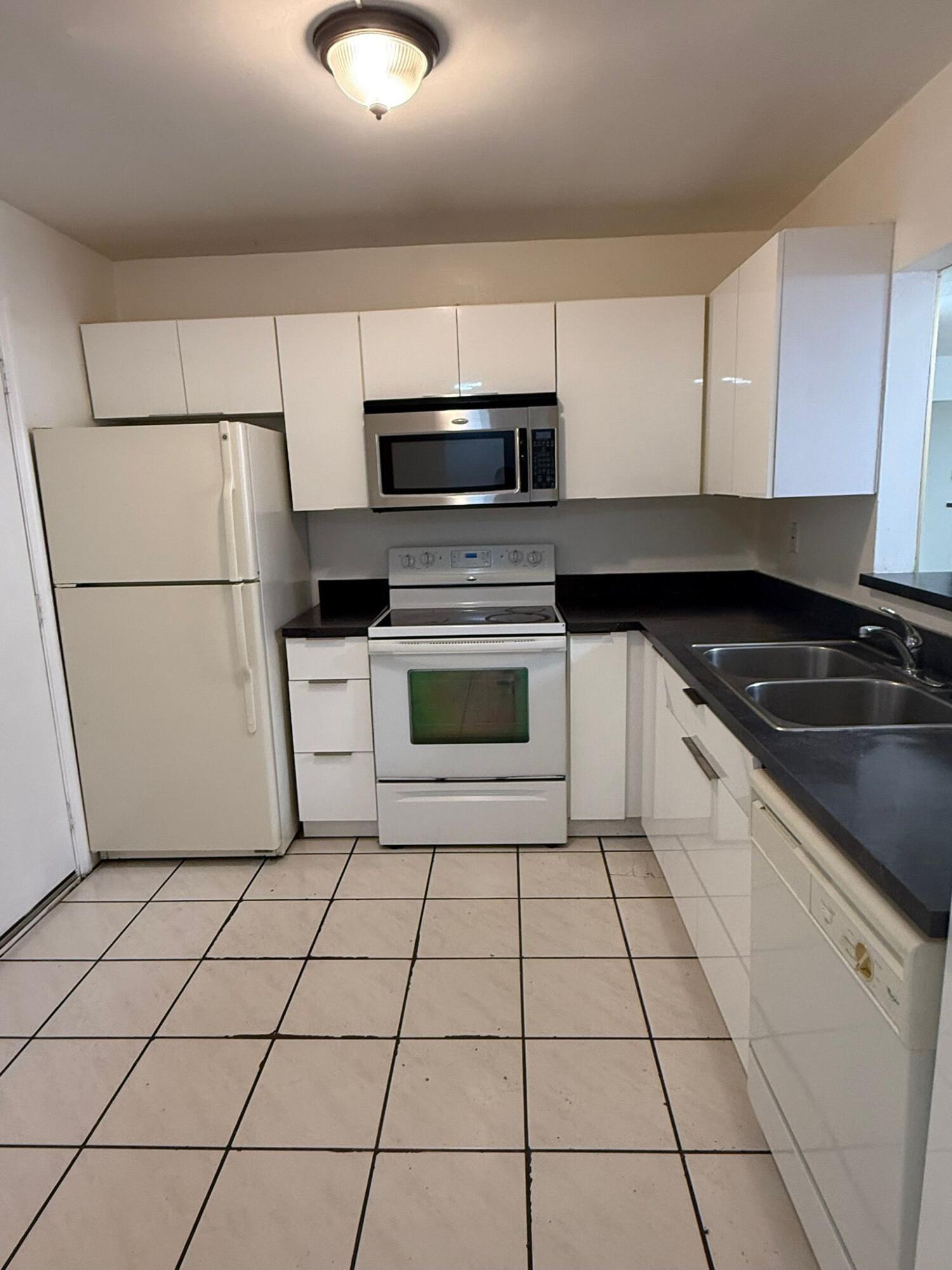 Welcome to this well-appointed two-bedroom, two-bathroom condominium located in Polynesian Gardens in Plantation, Florida. This residence offers 1,260 square feet of finished living space thoughtfully designed to maximize comfort and functionality. The five-story building provides convenient access to your home while maintaining the community atmosphere of the complex. Whether you're seeking a practical residence or a solid investment opportunity, this unit presents an attractive option for those looking to establish themselves in the area. as per association a 650 minimum credit score is required