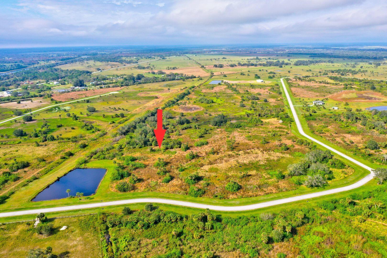 Welcome to Sherman Wood Ranches, a gated equestrian community offering privacy and tranquility. This 7.13-acre waterfront lot provides an excellent opportunity to build your dream home. Underground utilities are in place, and the community features well-maintained paved roads.  Residents enjoy access to scenic bridle trails throughout the neighborhood, ideal for equestrian enthusiasts. Located just minutes from Lake Okeechobee, the property offers convenient access to fishing, boating, and outdoor recreation. Downtown Okeechobee is nearby, providing a variety of dining, shopping, and entertainment options, with additional amenities available in surrounding cities.    Buyer and / or Buyer's Agent to verify all information and perform their own due diligence.