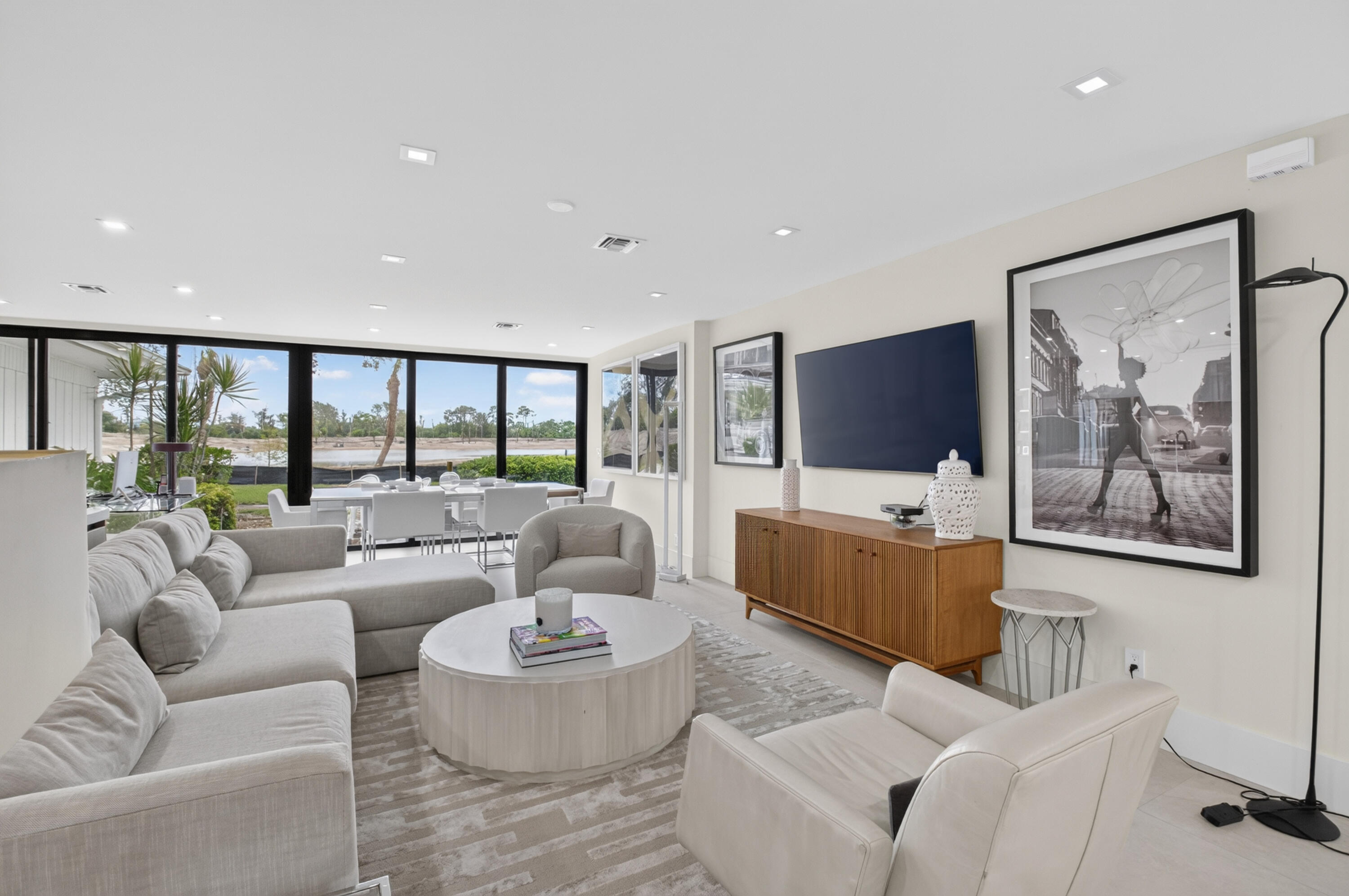 Move right into this beautifully renovated 2 BR, 2 BTH, extended villa offering spectacular lake and golf course views in the award winning Boca West Country Club. Designed for today's lifestyle, the open concept floor plan features a stunning kitchen overlooking the spacious living and dining areas, complete with quartz countertops, SS appliances and abundant cabinetry. Elegant 48x48 porcelain tiles throughout living areas and impact sliding glass doors providing peace of mind. Luxurious primary bathroom with oversized walk in shower. Enjoy the convenience of a covered carport for 2 cars along with electric service for your golf cart. Buy now before the October 1 joining fee increase and start living the unparalleled Boca West Lifestyle!!! Mandatory Joining Fee: $150,000, BWMA Capital Contribution: $10,000, Annual Social Dues: $24,454. *Club's Joining Fee & CC will be increasing by $75,000 on October 1st. Act now to beat the increase!