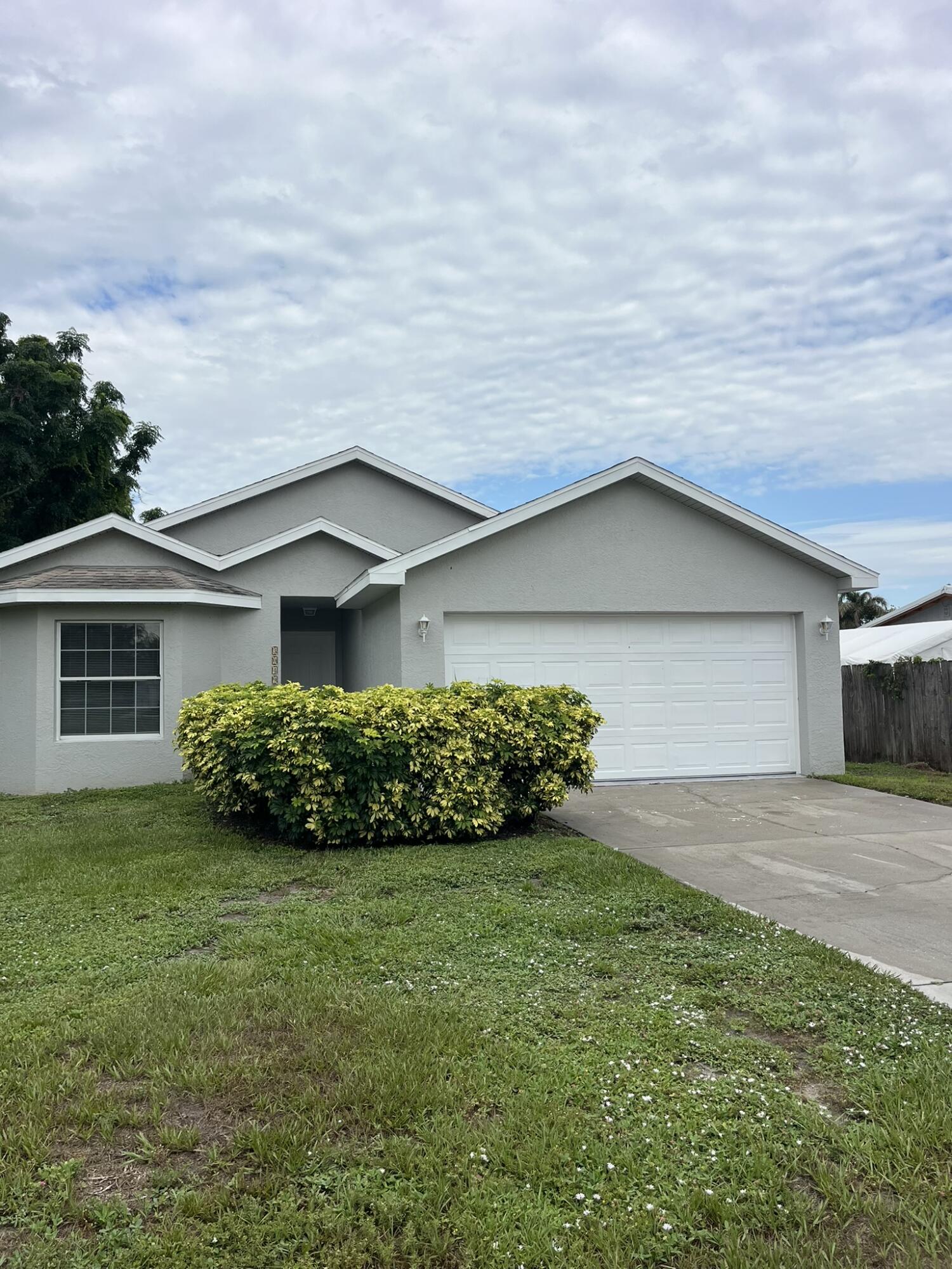 Don't miss this opportunity to own a beautiful 3-bedroom, 2-bathroom waterfront home situated on a canal with direct water access to Lake Okeechobee. Whether you're an avid fisherman, boating enthusiast, or simply enjoy peaceful waterfront views, this property offers the ideal Florida lifestyle.  Inside, you'll find a comfortable and functional floor plan with spacious living areas, a well-equipped kitchen, and generously sized bedrooms. Step outside onto the open back porch, where you can relax, entertain, or enjoy your morning coffee while overlooking the canal and watching boats pass by.  The attached 2-car garage provides ample parking and additional storage for vehicles, fishing gear, or recreational equipment. With convenient access to one of Florida's premier freshwater lakes. none