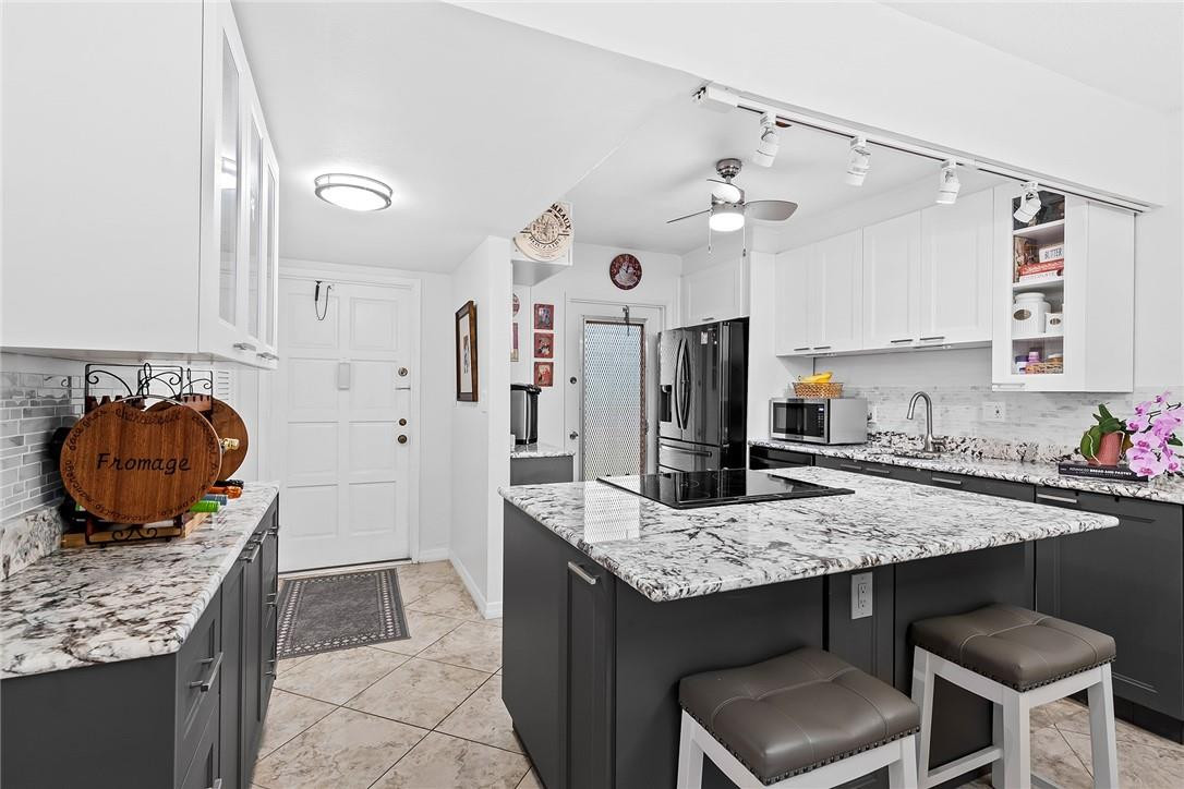 Welcome home to your fully remodeled condo in Hillcrest! This spacious 2 bedroom 2 bathroom home features brand new kitchen with open concept, all new stainless steal appliances, new water heater, and large bedrooms. The screened in balcony has a beautiful view of the the lush garden trees and canal. There is a great walking path behind the building along with the community Pools, exercise room, clubhouse, tennis, pickleball and more. There is One parking space assigned and plenty of guest parking. This 55+ building is very nice and well managed. The unit is in the perfect East Hollywood location - close to Hollywood Beach, The Hard Rock Hotel and Casino, Fort Lauderdale Airport, shopping and major roads.