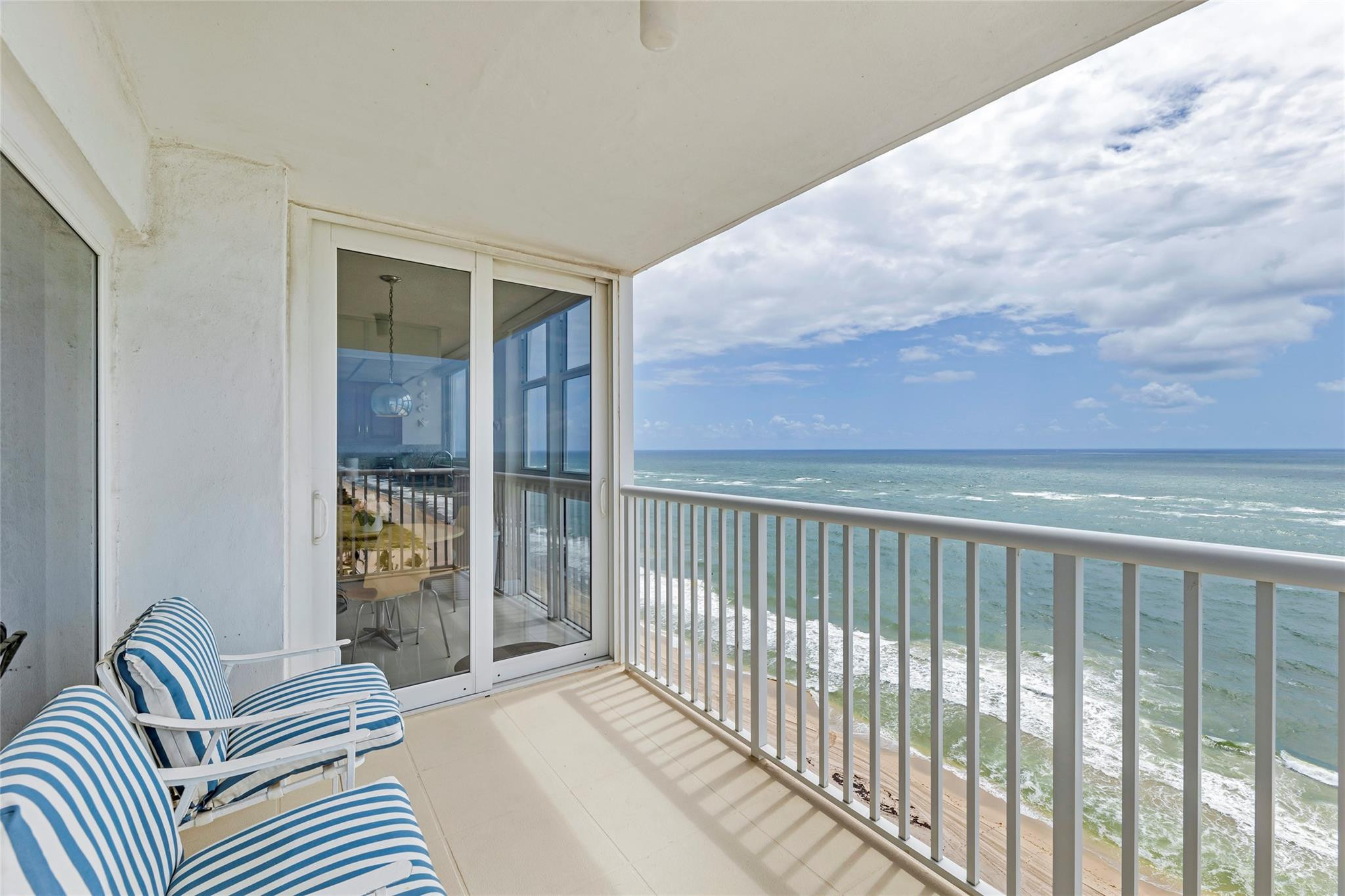 Rare seasonal rental! This stunning 18th-floor SE corner unit offers breathtaking direct ocean views from a wraparound balcony and floor-to-ceiling impact windows. Features include a split floor plan with 2 primary suites, in-unit washer/dryer, and resort-style amenities: 24-hour security, heated pool/spa, new gym, sauna, tennis/pickleball court, and garage parking for 2 cars (1 assigned, 1 open). Entertain in the 29th-floor Sky Lounge with panoramic coastline and skyline views. Internet and cable included. Available Nov 1-May 2 for a minimum 6 months + 1 day lease.