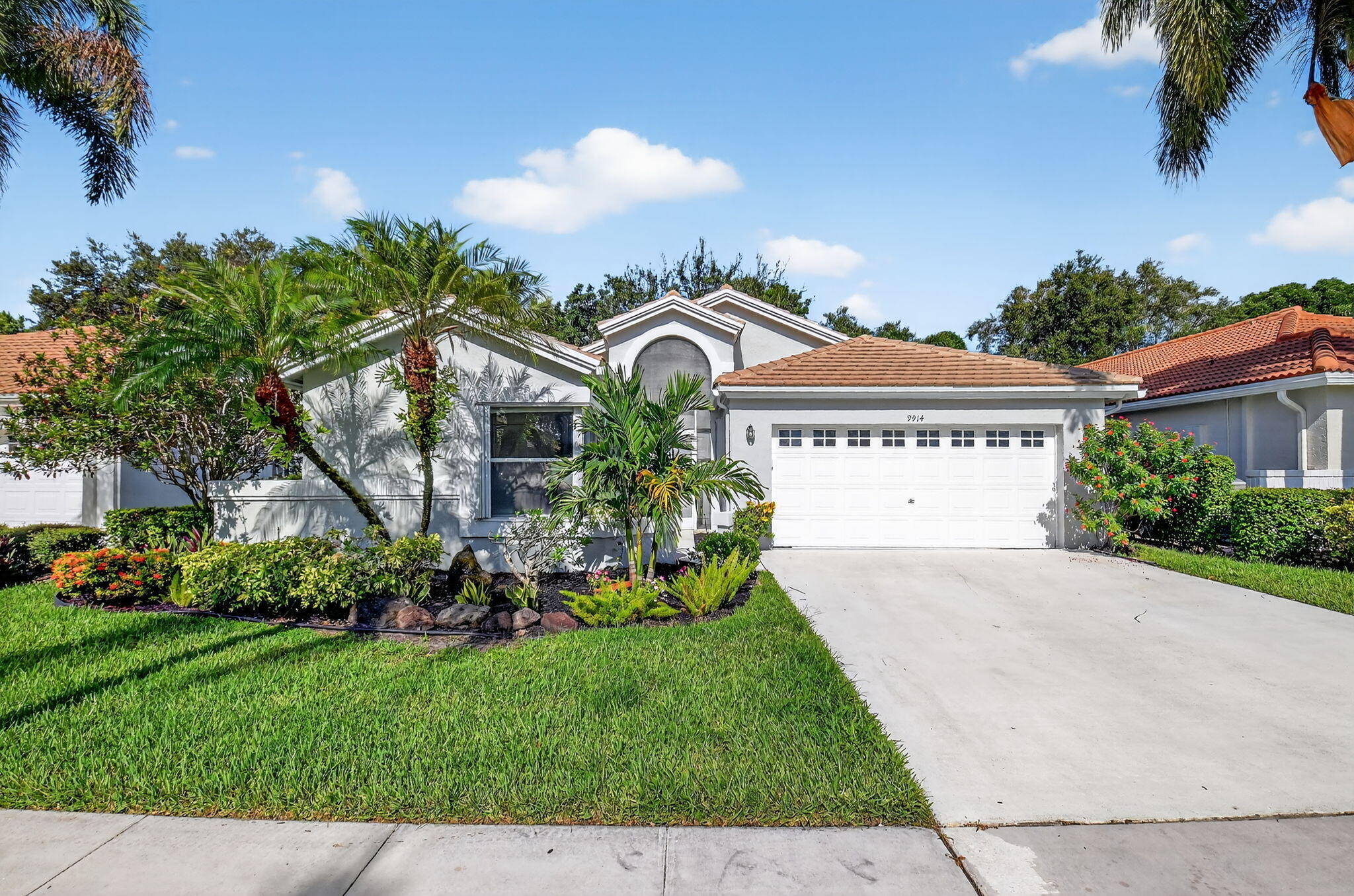 Welcome to this charming single-story residence in Palm Isles, Boynton Beach, offering 2,187 square feet of comfortable living space. This three-bedroom, two-bathroom home provides ample room for modern living with a practical two-car garage for convenient parking and storage. Compete with private screened-in patio with a plunge pool for effortless cooling off without ever leaving home. The open layout of this single-family residence maximizes the usable space, making it an excellent choice for those seeking a well-proportioned home in an established community. This property combines residential comfort with convenient access to all that Boynton Beach has to offer. Take advantage of the community's updated clubhouse and incredible amenities — shuffleboard, a common library, sauna, hot tub, and tennis court. With the brand-new clubhouse now open, Palm Isles living has never offered more. Some photos in this listing have been virtually staged to show the home's potential. Rooms are currently vacant.