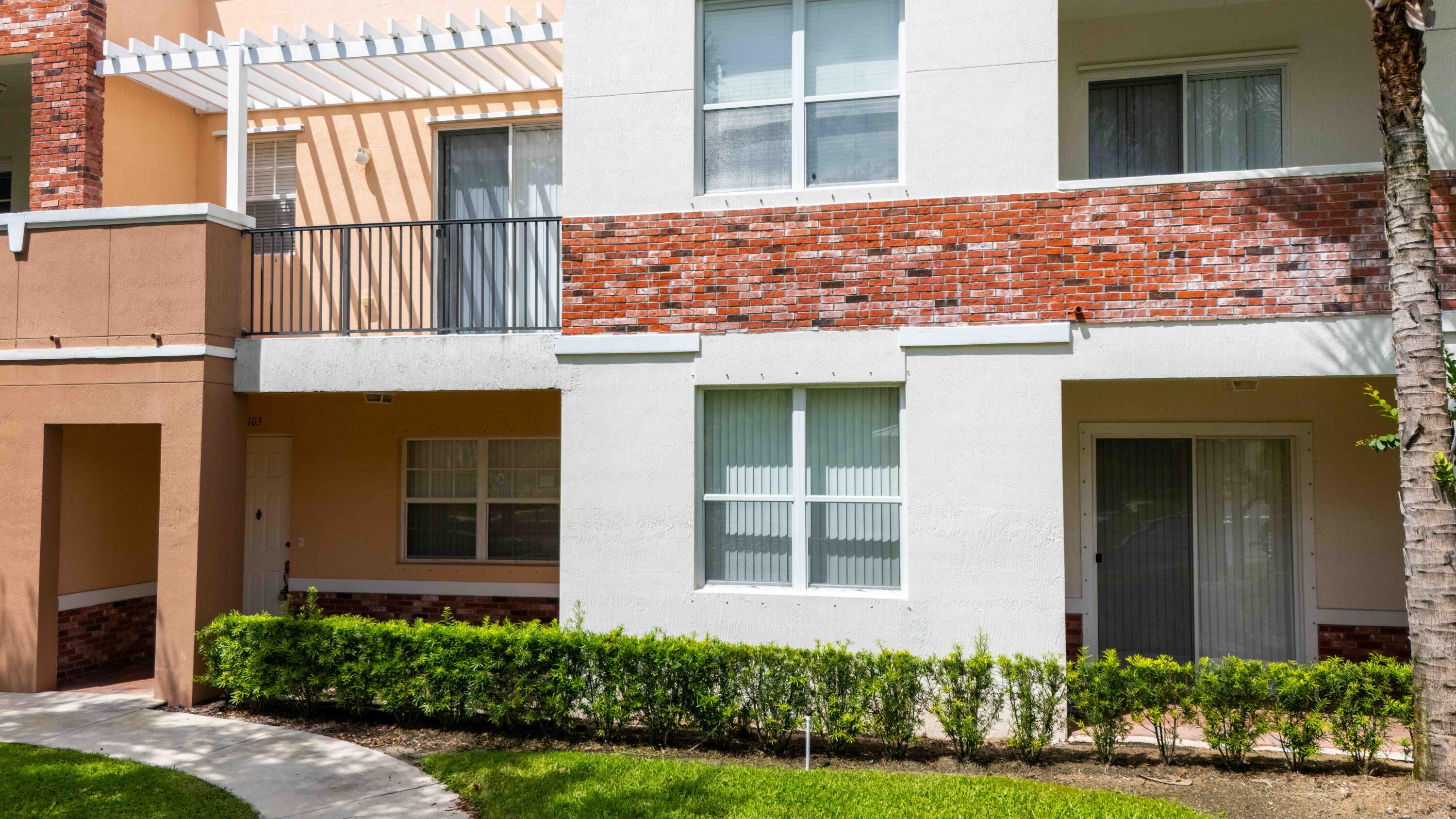 Welcome to the Heart of Tradition! This move-in-ready 2 bedroom, 2 bathroom condo with a bonus room that can be used as a den or dining area offers the perfect blend of convenience and lifestyle. Located on the first floor, this home is directly across from Tradition Town Hall, the community pool, and all the shopping, dining, and entertainment Tradition has to offer. Imagine relaxing by the pool while enjoying live music from the Town Square concerts! Inside, you'll find a comfortable and functional layout with a bright living space, well-appointed kitchen, spacious bedrooms, and the flexible bonus room. The condo also includes a 1-car garage for added convenience. Whether you're looking for a full-time residence, a seasonal getaway, or an investment property, this home checks all the boxes. Don't miss the chance to live in one of Tradition's most desirable locations!