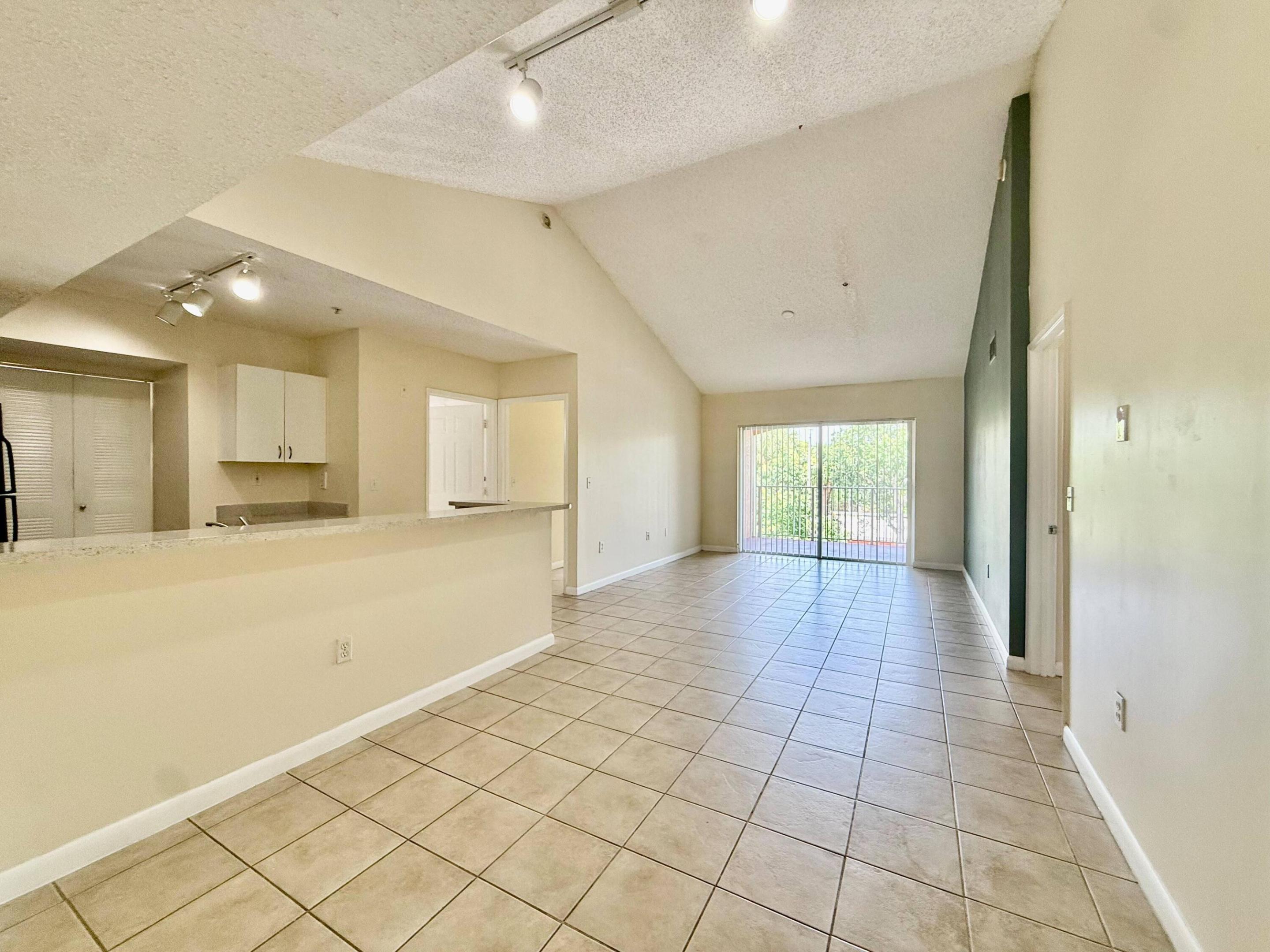 Spacious top-floor 2-bedroom, 2-bathroom condo located in the desirable Riviera Palms community. This well-designed 1,112-square-foot residence features tile flooring throughout, an open living and dining area, newer kitchen appliances, and a convenient split-bedroom layout with two generously sized primary-style bedrooms. Enjoy comfortable South Florida living in a centrally located Coconut Creek community close to shopping, dining, major roadways, and everyday conveniences.