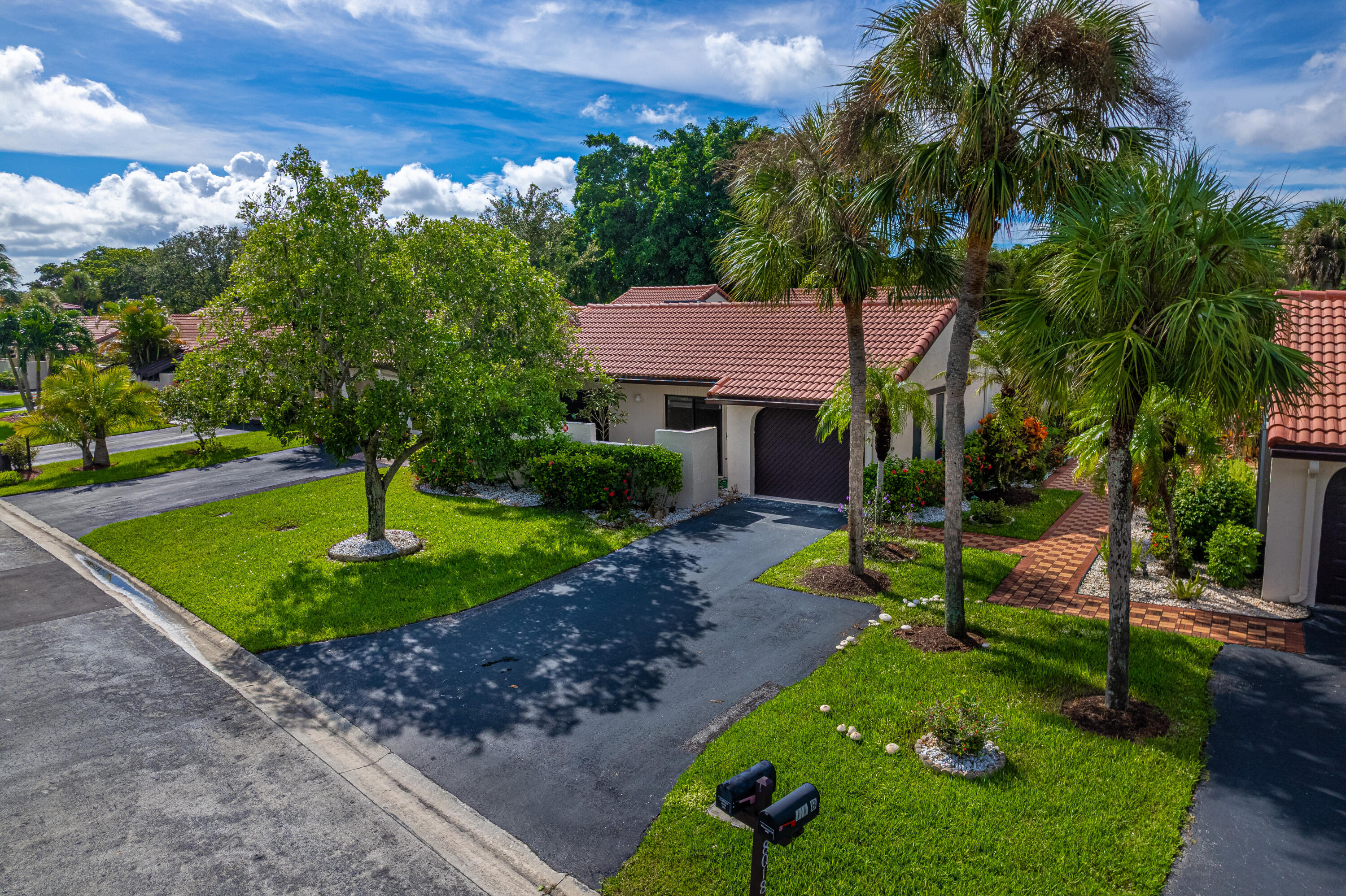 Gorgeous villa in The Greens of Boca Lago ,back on the market after few months of the owner occupancy. Master bathroom shower has been redesigned and kitchen cabinets as well. Large square footage and rooms distribution insure a complete privacy of the owner and their guests. Very large living area including spectacular entrance. Roof is 2024,AC is 9 years, new appliances. 1 car garage, plenty of storage and closet spaces. Even a panic room is hidden in this house!