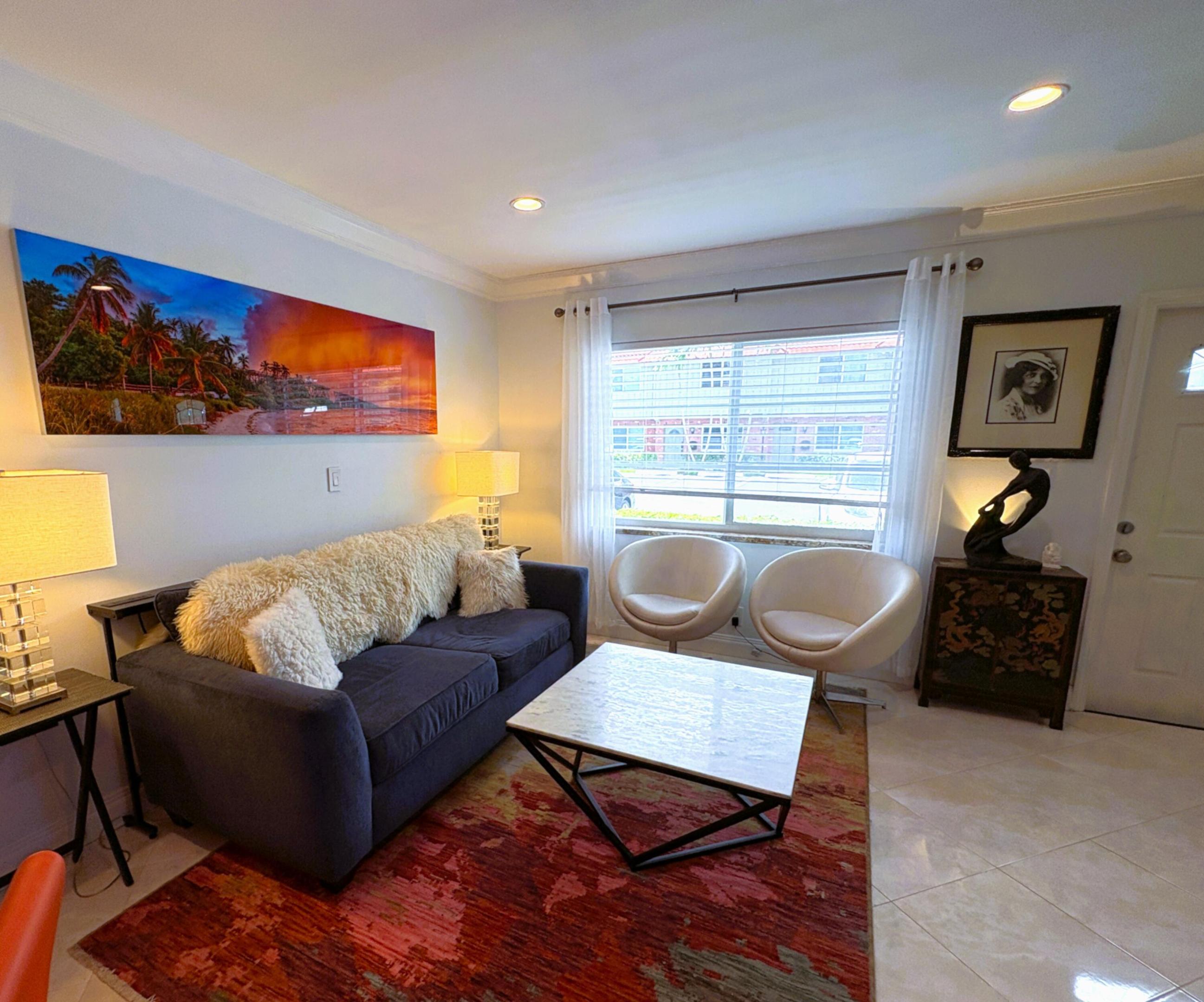 Discover the perfect blend of style, comfort, and lifestyle in this beautifully renovated 2-bedroom, 1.5-bath split-level townhome in the heart of Wilton Manors. Offering approximately 1,100 SF of thoughtfully designed living space, this home features impact windows and doors, a sleek modern kitchen, spacious light-filled living areas, an elegant designer bathroom with floor-to-ceiling tile and a Jacuzzi soaking tub, in-unit washer and dryer, and a private fenced courtyard ideal for morning coffee, outdoor dining, or relaxing after a long day. Enjoy the community pool, assigned parking with guest parking, and a professionally maintained community, all just a short stroll from the vibrant restaurants, cafés, boutiques, and nightlife of Wilton Drive. Experience the walkable South Florida lif