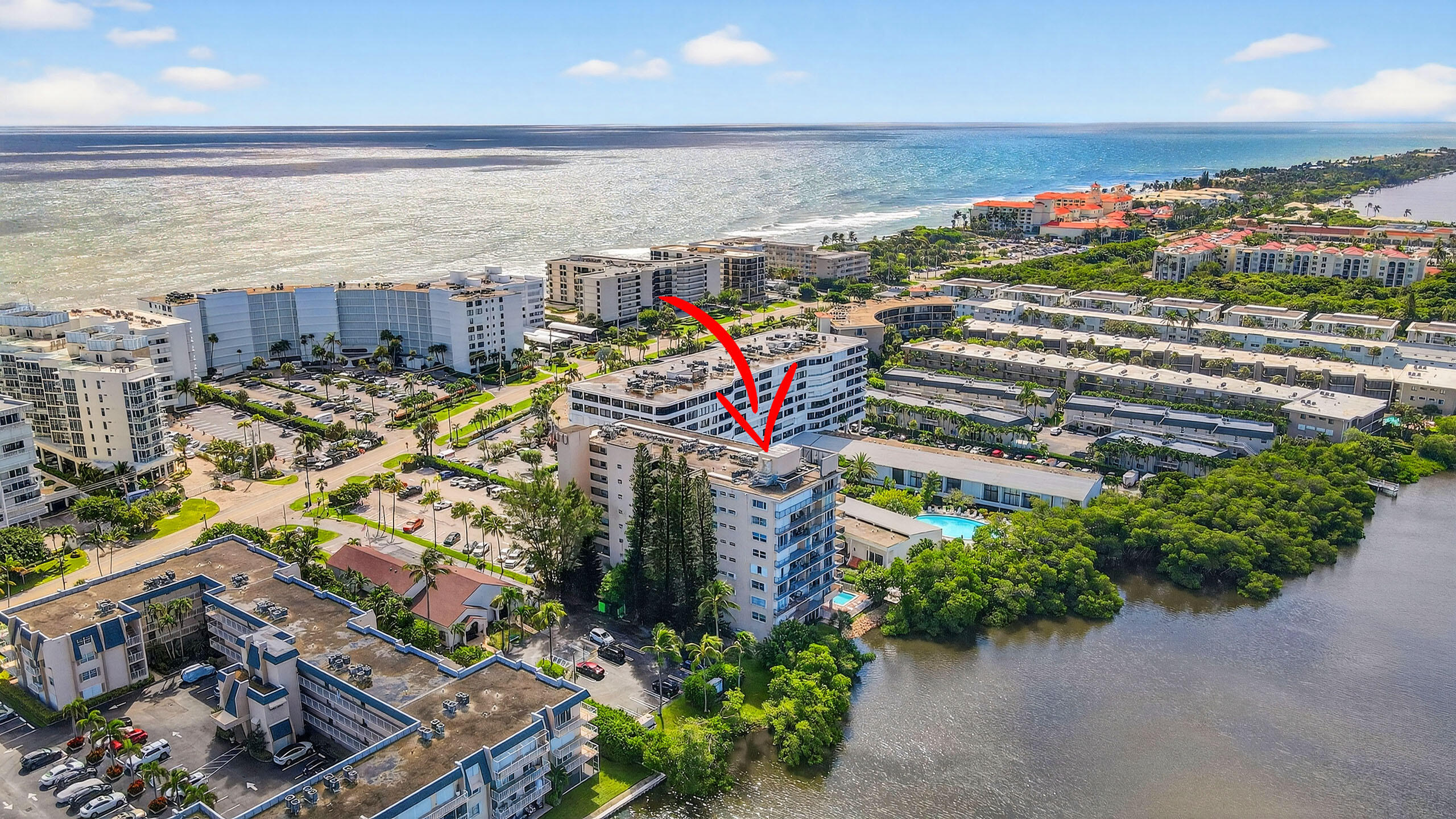 Light and bright 2-bedroom unit currently configured as a one-bedroom/2-bath open floorplan with an open kitchen.  Motivated Seller.  Get a 2-bedroom/2-bath unit for the price of a 1-bedroom unit and make it your own.  Laundry is in the unit.  Great intracoastal location with deeded beach access across the street.  Walk to multiple restaurants, Eau Resort and Publix.  The property has a pool, saunas and community room on the ICW.
