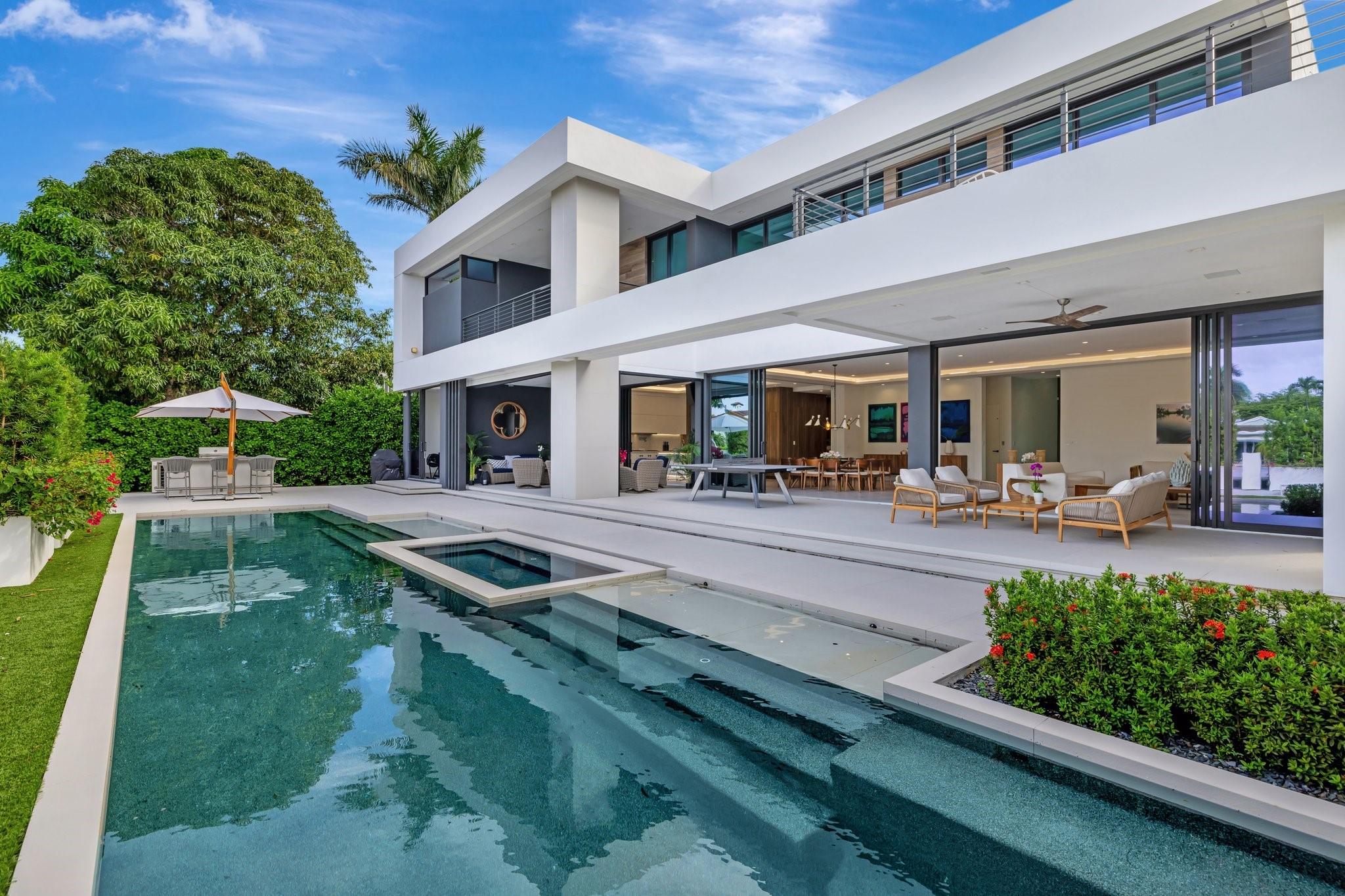One of the most architecturally stunning custom Modern deep-water residences in guardhouse secured Seven Isles.100ft waterfrontage on superior Isle. Walled & gated for privacy & security. Total 9,000 +/- sf, sun-filled exceptional floorplan, extremely open living & entertaining areas, amazing Italian Chef's kitchen, butler's pantry, mother-in-law/captain's or wellness suite 1st level. Entire back of the house opens to expansive covered terraces & resort style pool. Summer kitchen. Potential 7 bedrooms, 7 full & 1 guest bath, home office. Elevator, additional living room/media area/bedroom. Superior primary suite, private balcony separate spa style baths & large closets. All bedroom suites open to balconies. One of the very best Las Olas newer construction deepwater values at $1,575 per sf.
