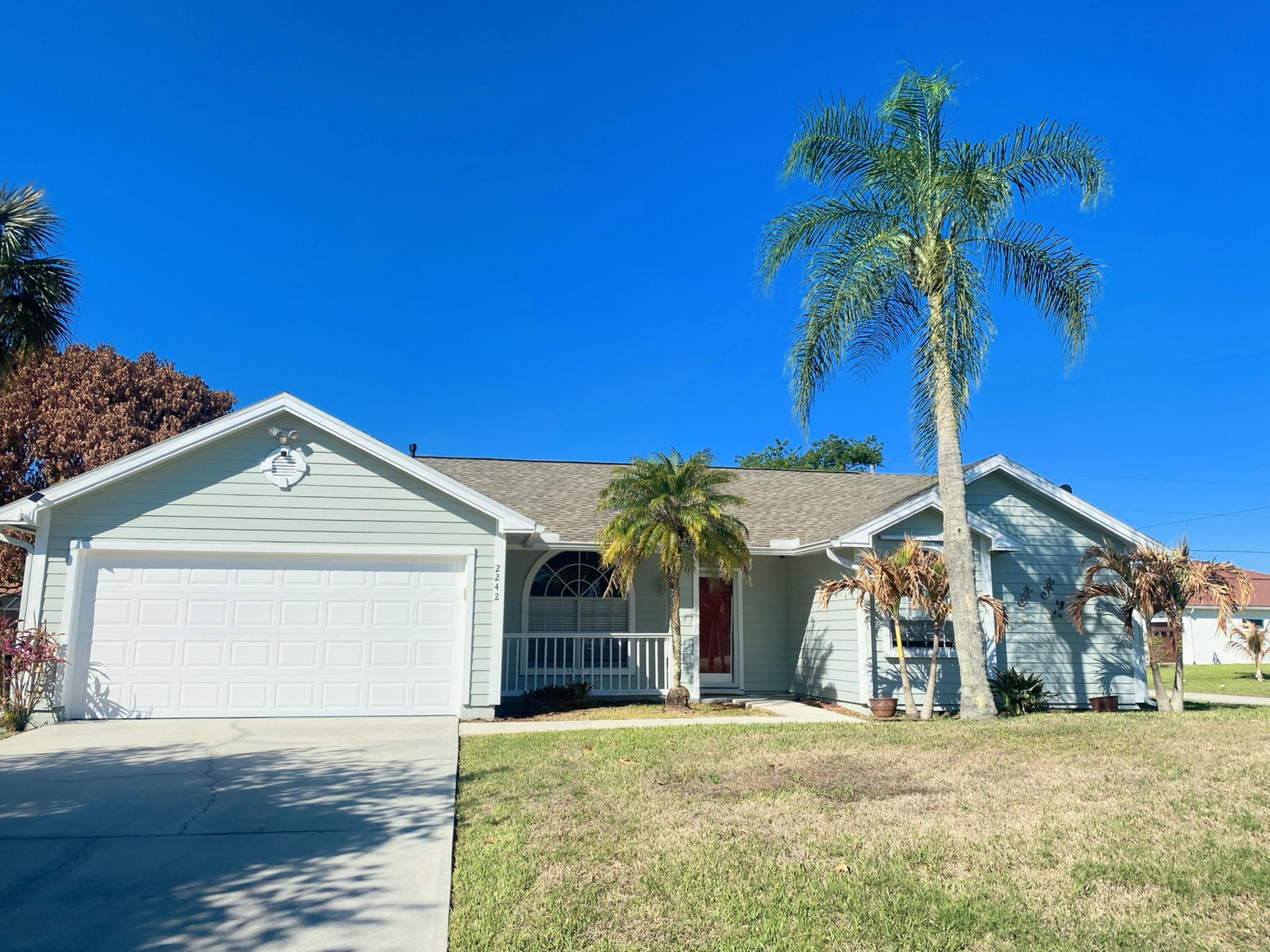 Motivated Seller! Solar Powered! Beautifully spacious 3 bedroom, 2 bath home in Port St. Lucie featuring a well designed layout and generously sized rooms throughout. The home offers a large primary suite with a private office or sitting area, multiple living spaces perfect for entertaining, and a sizable yard ideal for relaxing or enjoying outdoor living. Conveniently located just minutes from Tradition, shopping, dining, schools, and major roadways. This home offers comfort, space, and versatility in a desirable location. Don't miss the opportunity to make this exceptional property your own!