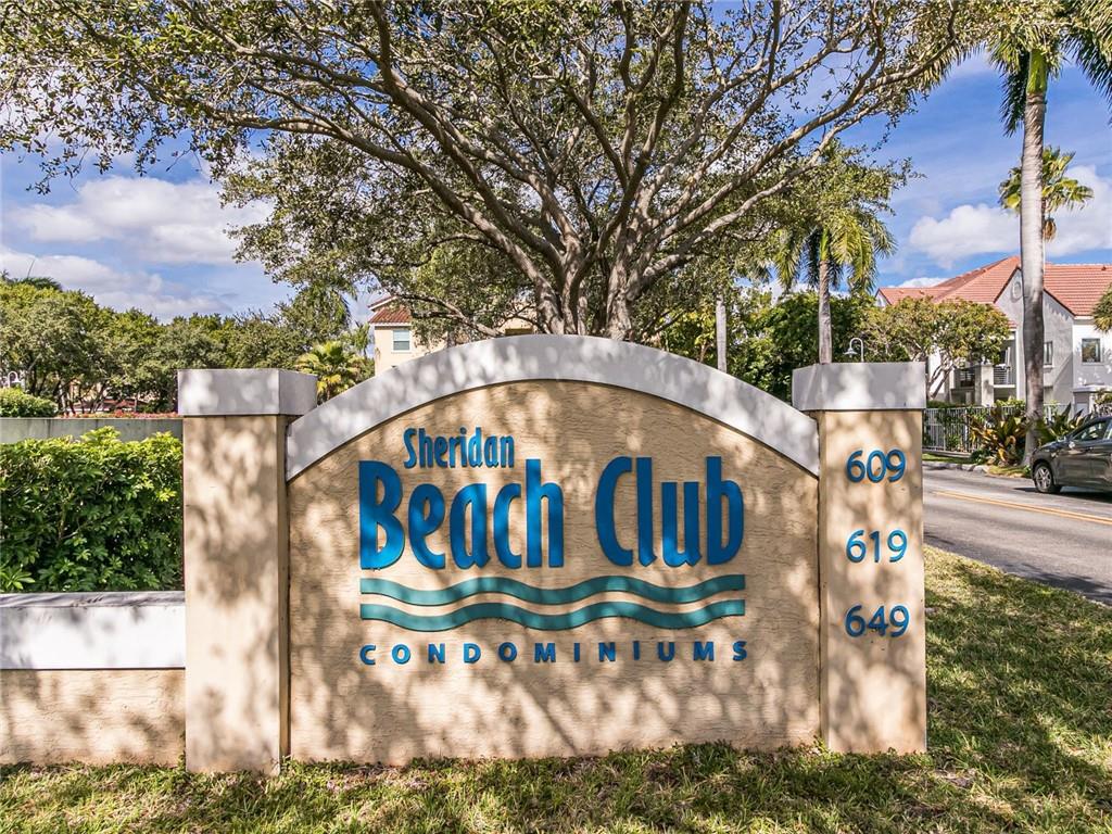 WELCOME TO SHERIDAN BEACH CLUB! Great opportunity to buy in gated community built in 2003, less than a mile from the beach! Move-in ready, this unit is sold FURNISHED, TURNKEY! No need to shop, just bring your toothbrush! Spacious split floor plan with vaulted ceilings. This unit offers an upgraded kitchen with wood cabinets, granite countertop and newer appliances. WASHER / DRYER inside unit. Spacious open dining / living room area very well furnished. Ceramic floor in living area, carpet in bedrooms. Clean baths well maintained. Master bedroom with generous walk-in closet. Keyless door lock. Accordion Shutters. PET FRIENDLY BLDG (30 pounds max). Rental allowed after one year. Quiet & secure community. Low maintenance, only $400 / month. Walking distance to beach, groceries, and shops.