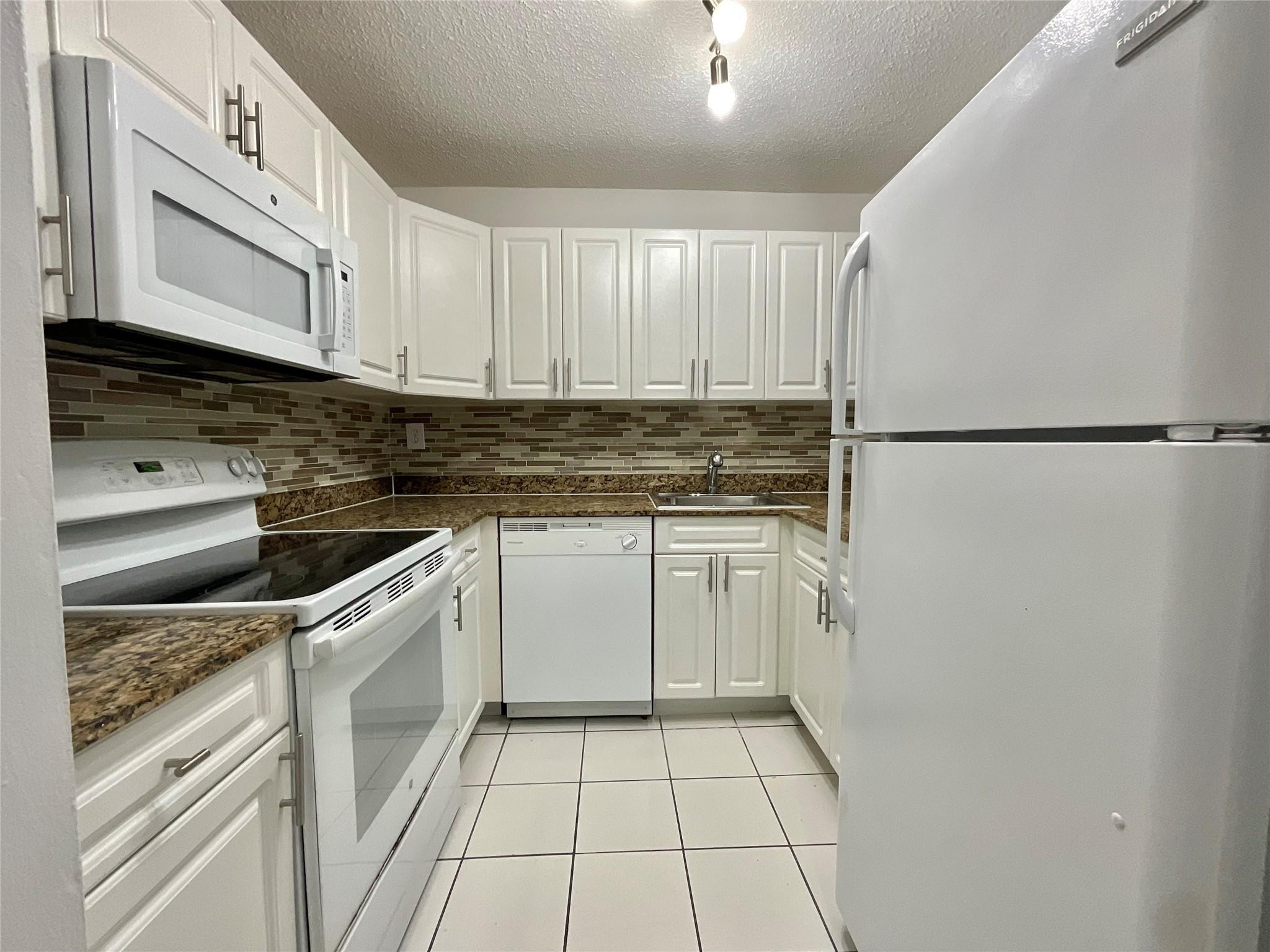 **ONLY $99 DEPOSIT! (restrictions apply) **FAST & EASY MOVE IN**LARGE FRIENDLY PETS ARE OK! Very spacious living area and a huge walk in closet make this unit a don't miss opportunity! Living here is like being on a permanent vacation - the waterfall pool with heated spa and gazebo, full array of resort-style amenities and high-energy ambience of the fitness center, billiard room, racquetball courts and playground are only matched by the comfort and beauty of the residences. With features like walk-in closets, and elegant bathrooms, your ideal home awaits. Located just min from Miami International Airport, FIU and several prominent shopping destinations, including world famous Dolphin Mall.