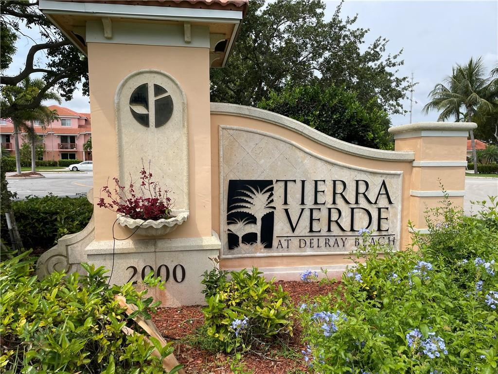 Rarely available first floor 2/2,  corner unit with attached garage, overlooking the water.  Gated entry and resort like amenities. A/C 2022, Newer water heater and roof, Unit has crown molding ,  a split floor plan with ensuite bathrooms, plenty of closet space, a beautiful open kitchen , dining room and living room,  with lush gardens surrounding the terrace. Bike/Jog path. furniture negotiable.  Centrally located in Delray Beach , less than a mile to beach, walk to Whole Foods and other amazing shopping , close to I-95 , downtown Delray and Boca Raton.  Resort style pool, volleyball court, tennis courts, gym and community room, billards room, business center , car washing station, and onsite management. Pre-approval letter or Proof of funds required with offer.