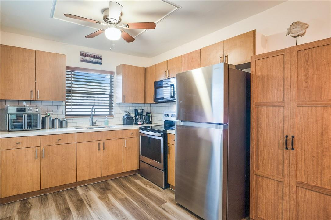 MODERN, UPDATED AND REMOVATED! FIRST FLOOR IN ADULT GATED COMMUNITY IN HOLLYWOOD.   POOLS AND CLUBHOUSE. THIS IS A SPACIOUS 2/2 FIRST FLOOR CONDOMINIUM.  ONE OWNER MUST BE 55 YEARS OF AGE. UNIT COMPLETELY UPDATED AND REMODELED, LAMINATE WOOD FLOORING, NEWER CENTRAL A/C.   ALL TILED SCREENED PORCH.  OPEN AND REMODELED KITCHEN WITH QUARTZ COUNTER-TOPS, ALL TILED BACK-SPLASH WITH STAINLESS APPLIANCES.  TWO LARGE REMODELED BATHS-ONE LARGE ALL TILED STEP IN SHOWER,  QUARTZ HIGH TOP VANITY, THE MASTER BEDROOM HAS  WALK IN CLOSET, COMBO TUB-SHOWER, UPDATED VANITY.   NO LEASING PERMITTED AND NO PETS.  Buyer must show income proof of $40,000 a year.