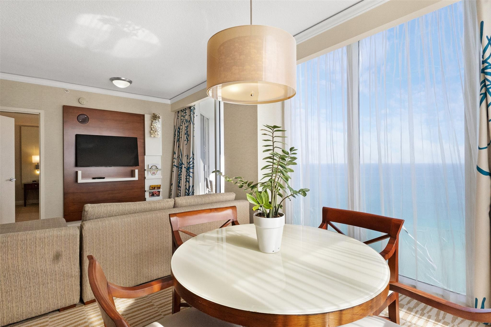 Exceptional high-floor residence at the oceanfront Trump International Beach Resort, offering stunning views & a seamless blend of luxury living & income potential. Unit 2614 Available is a turnkey condo-hotel residence designed for owners seeking a low-maintenance beachfront asset in one of Sunny Isles Beach’s most recognizable resorts. Residents & guests enjoy access to world-class amenities including beachfront pools, full-service spa, fitness center, on-site dining, room service, concierge, valet. Ideally positioned with easy access to Bal Harbour, Aventura, and major airports. Perfect for personal use, seasonal enjoyment, or participation in the resort rental program. 1031 exchange opportunity avail.-May be purchased individually or together w/ adjacent unit 2615 as a package offering
