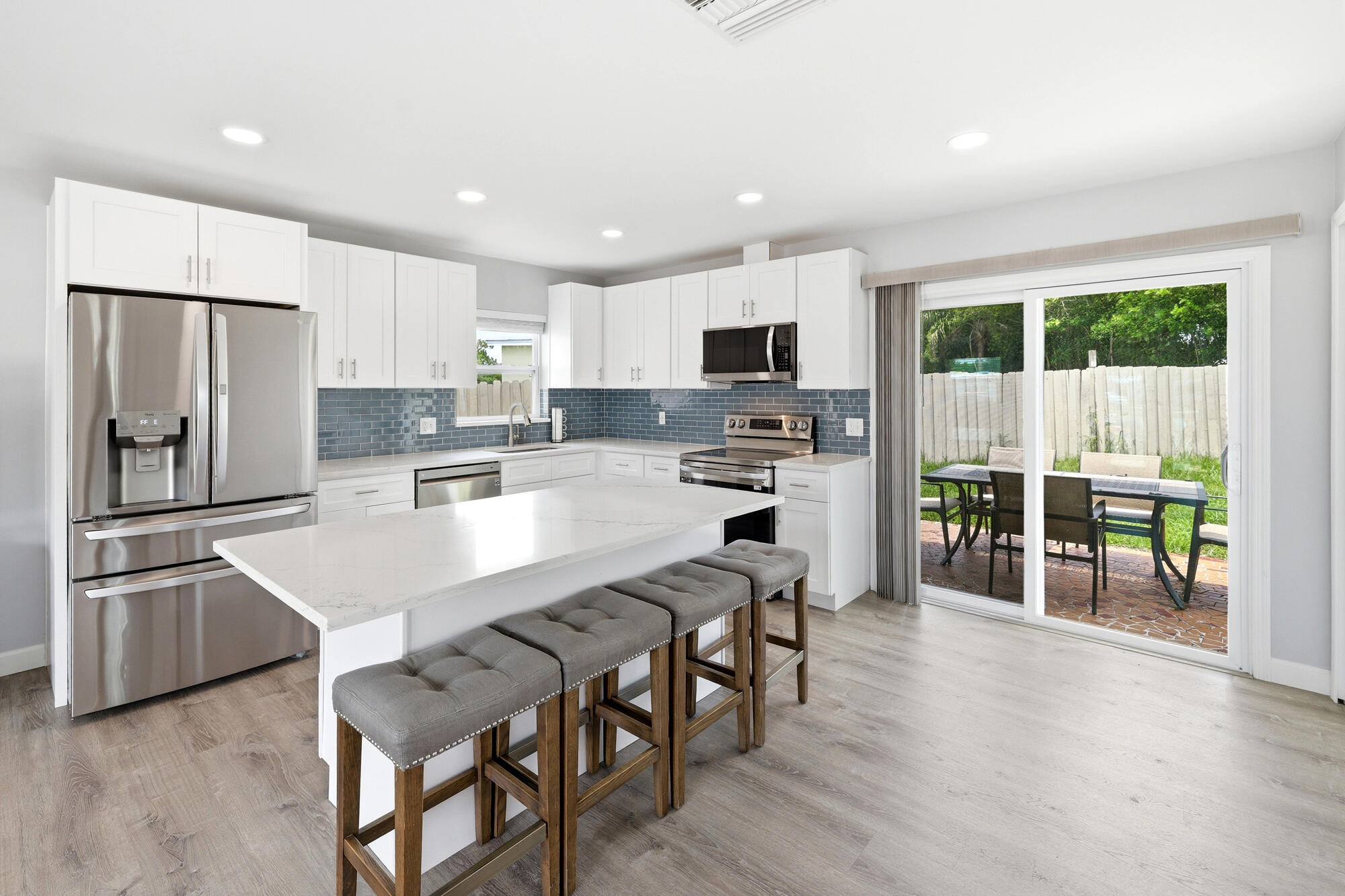 This well-maintained 3-bedroom, 2-bath home with a bonus room offers a comfortable and functional layout with several important updates throughout. Improvements include a kitchen and flooring update in 2021, AC in 2021, roof in 2020, water heater in 2023, washer/dryer added in 2023, and fresh exterior and interior paint completed in 2026. A 10x16 shed with loft provides excellent additional storage or workspace. Located in unincorporated St. Lucie County, the property is subject to county taxes, with no City of Port St. Lucie property tax.
