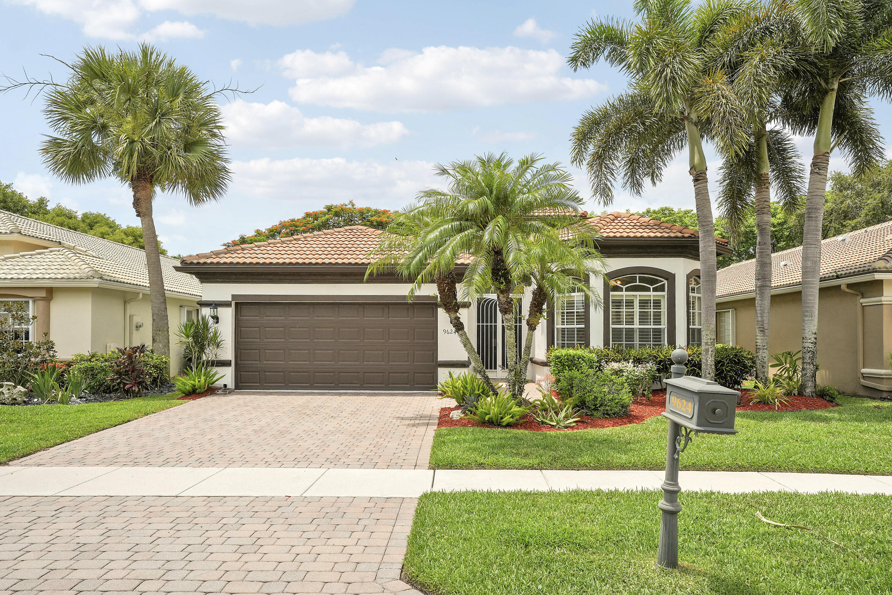 Welcome to this beautiful Novara floor plan featuring 3 bedrooms, 2 bathrooms, with views of both the lake and canal. The oversized, fully screened and tiled lanai provides the perfect setting to relax, entertain, or simply enjoy the peaceful waterfront scenery. Inside, you'll find soaring ceilings and oversized neutral tile flooring throughout the main living areas and second bedroom, creating a bright, spacious, and elegant atmosphere. The living  room and dining area offer an ideal space for entertaining family and friends. Wake each morning to tranquil water views from the spacious primary suite. The front guest bedroom is enhanced with a charming bay window, plantation shutters, and newer carpeting, while plantation shutters in the family room add both style and privacy. The kitchen is designed for both beauty and function, featuring 42-inch cabinetry, convenient pull-out shelves, a pot-and-pan drawer, under-cabinet lighting, and abundant storage. The laundry room is equipped with upper cabinets, a hanging clothing bar, and a washer and dryer for added convenience. Additional features include garage shelving, accordion hurricane shutters across the rear of the home, and numerous thoughtful upgrades throughout as well as brand new landscaping.. This home that combines an exceptional floor plan with outstanding waterfront views and comfortable Florida living. As you drive through the guarded gates, you realize Bellaggio is an Active Community. From its well-manicured grounds and tropical plantings to its 10 Har-tru Tennis Courts, 5 lighted for night play, Bocce Ball, Indoor and Outdoor Pools, separate Fitness Center, Bistro Café, and Pickleball Courts. Both Pickleball and Tennis have Professionals on premises teaching Individuals and Groups. There is a Grand Ballroom featuring Top-notch Entertainment and Events with a full-time "Lifestyle" Director. There are also dozens of clubs, and Activities, Card Rooms and Billiard Room, Arts & Craft Center and much, much more... This home offers an exceptional opportunity to enjoy Bellaggio's lifestyle living at its finest!