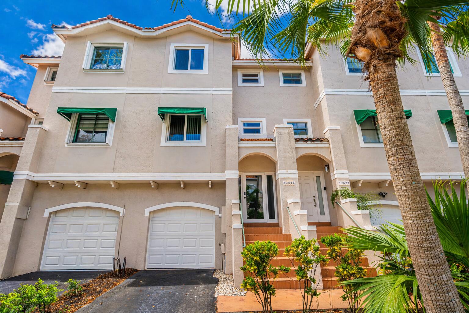 Welcome to Allegro at Sawgrass Mills! This spacious tri-level townhome features 3 bedrooms, 3 full bathrooms, a 1-car garage, and a layout designed for comfortable living. Major updates include all impact windows and doors plus a 2025 roof for added peace of mind. The updated kitchen offers white cabinetry, granite countertops, stainless steel appliances, and tile flooring throughout the living areas. Enjoy a fenced patio on the first floor and a second-floor balcony off the living area. Whether heading out for dinner, catching a hockey game or concert, or commuting throughout South Florida, just minutes from Sawgrass Mills, Amerant Bank Arena, restaurants, shopping, parks, I-75, and Sawgrass Expressway. This move-in ready home combines space, comfort, and convenience!