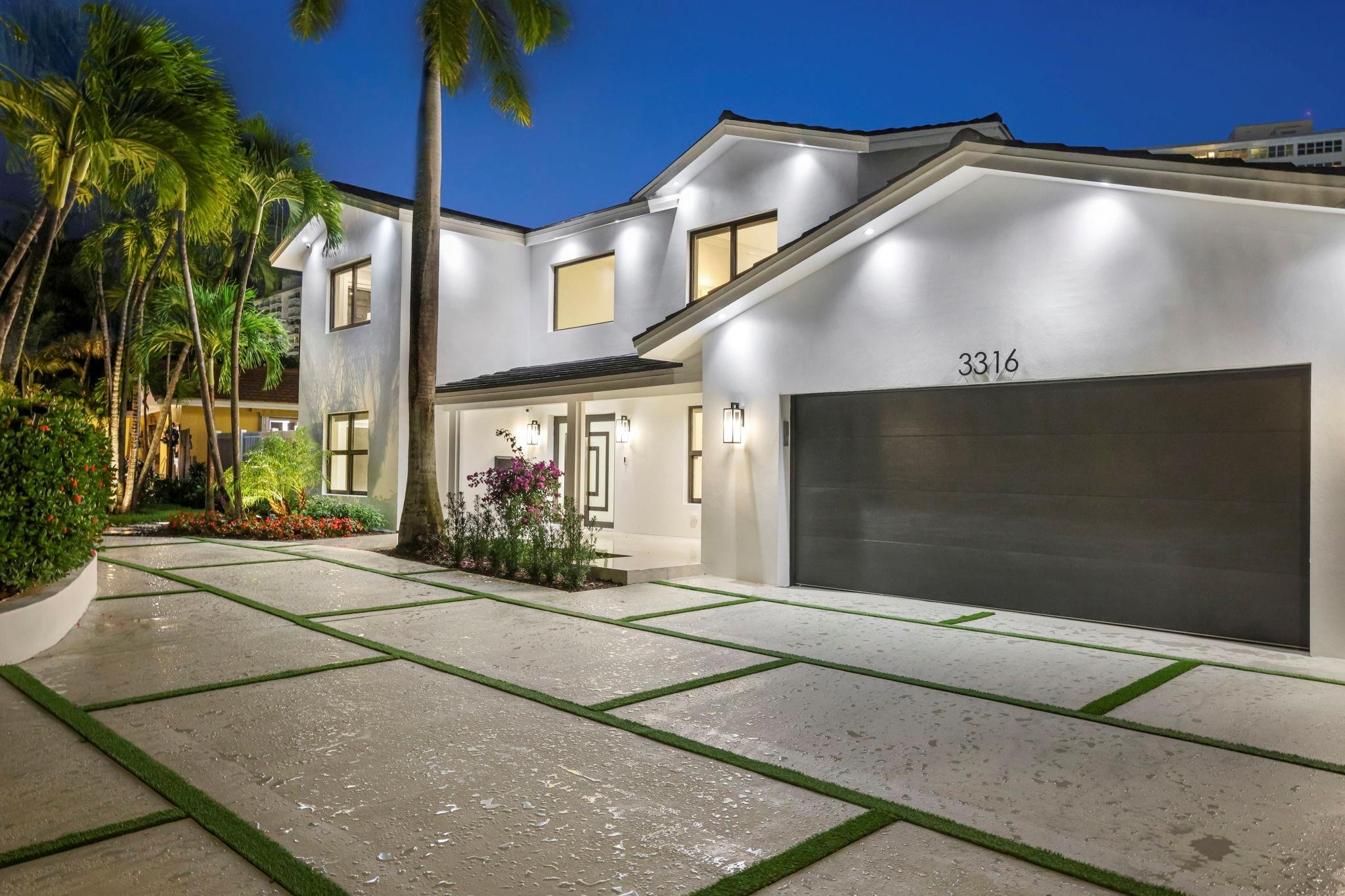 Welcome to Coastal Grandeur! Once-in-a-lifetime opportunity to own your brand-new waterfront coastal masterpiece, rebuilt from the concrete up in highly sought-after Bermuda Riviera in East Fort Lauderdale. This 4BD/4.5B residence showcases exceptional craftsmanship exuding high-end finishes throughout. Taj Mahal stone accents welcome you at the entry. Chef's kitchen featuring Wolf induction range, Sub-Zero fridge/freezer, under-counter lighting, and butler's pantry. Additional room ideal for office/flex space. Fully equipped smart home with security system. Spacious bedrooms with spa-inspired baths and illuminated mirrors. Outdoor oasis with highly coveted southern exposure. New pool featuring lighting, fountains and a brand-new dock & seawall perfect for relaxing and entertaining!