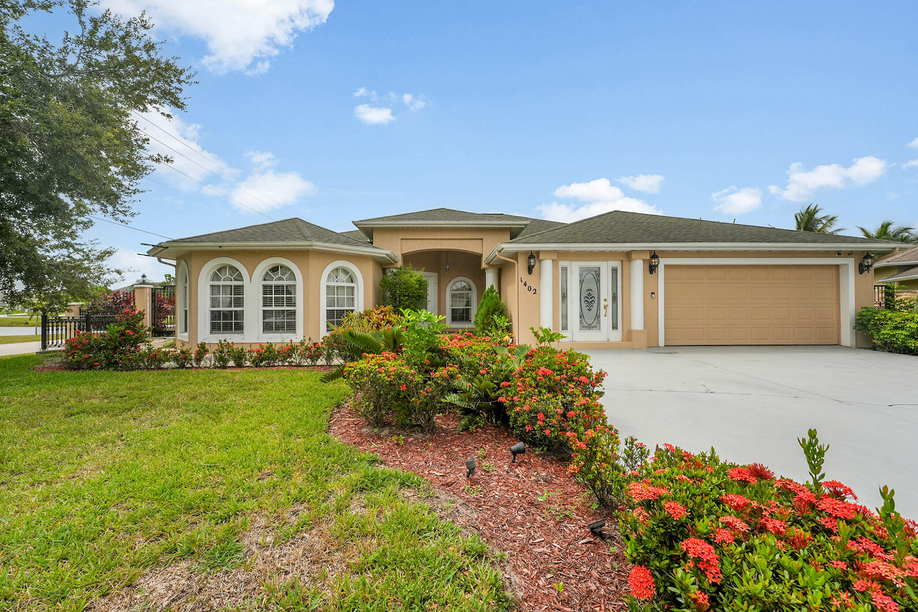 Parking for RV/Boat available. Beautiful pool home in a PRIME Port St. Lucie location! This original-owner property is tucked away on a quiet cul-de-sac. Recent updates include AC (2025), pool pump (2026). The home features 3 bedrooms, 2 baths, 1 office, 1 sitting room, 2 dining areas, 2 entrances, and 2 gates, offering flexibility and convenience. The open floor plan showcases vaulted ceilings, abundant natural light, and a spacious kitchen with ample storage. The primary suite includes a walk-in closet and spa-style bath. Enjoy a screened patio, sparkling pool, fenced yard, RV/boat parking, and the freedom of NO HOA. Appliances (refrigerator, washer, dryer, oven, microwave, dishwasher) are included; furnishings and décor are not. Minutes to I-95, Turnpike, and shopping.