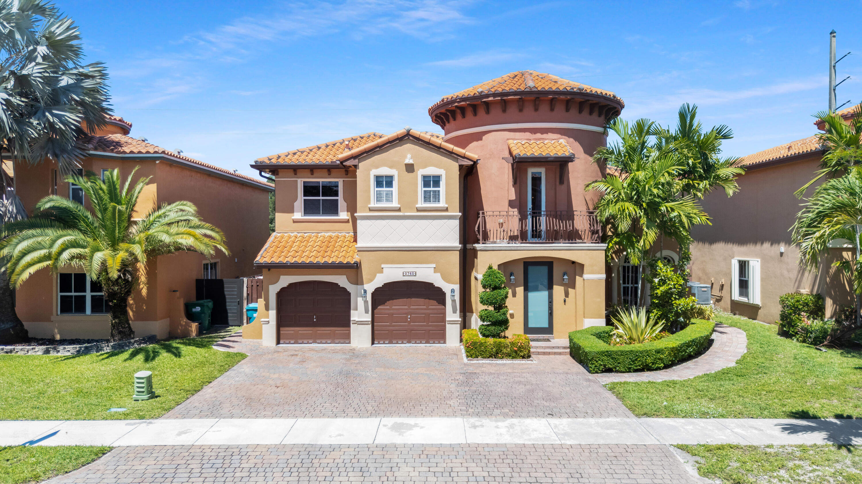 Discover the prestigious "Hermes" model in Venetian Isles! This 4BR/4.5BA masterpiece spans 3,885 total SF on an oversized lot, blending timeless Mediterranean architecture with high-end modern updates. The grand foyer leads to soaring vaulted ceilings and arched windows bathed in natural light.  A chef's dream, the remodeled kitchen features a sprawling center island, premium appliances, and a breakfast nook flowing into the family room. Retreat to the primary suite's spa-like sanctuary with dual sinks and a glass-enclosed shower. Outside, French doors open to a private oasis: a pristine in-ground pool, open patio, and manicured grounds. Secured by a pro-grade camera system and gated entry, this home offers ultimate privacy and luxury near top-tier schools.