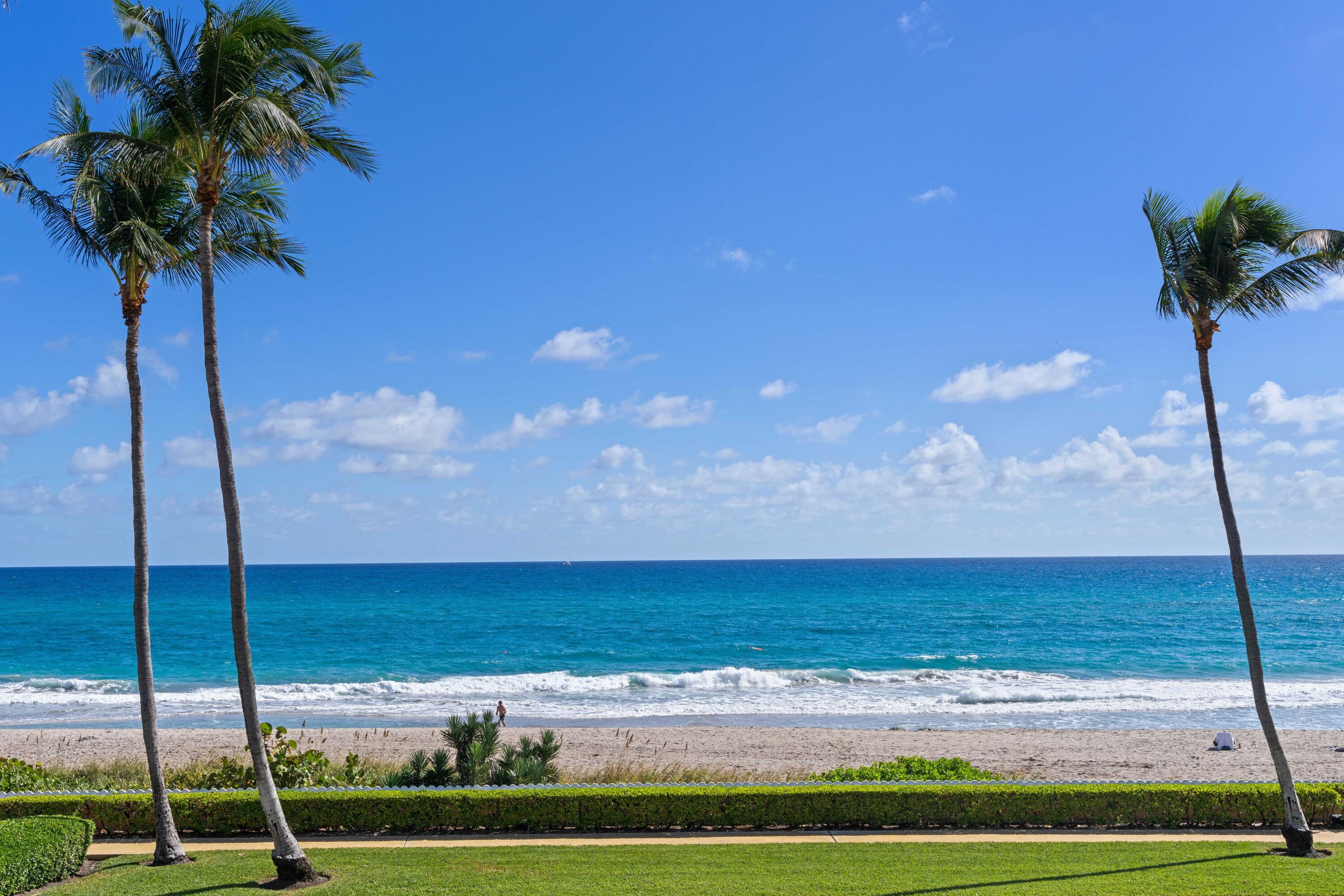 DIRECT OCEANFRONT RENOVATED APARTMENT w/ panoramic ocean views from every room including the kitchen. Rare corner 2BD/2BA. Impressive crown moldings, marble baths, and a sleek modern European kitchen. Original 2-bedroom floor plan has been altered to enhance the ocean views and space, & can easily be converted back to the original 2-bedroom layout. 5 sets of Newer impact glass sliding doors open up to the wrap-around terrace facing the East and North. Amazing location in the center of town. 3 blocks to Worth Avenue, the finest restaurants & close to the Breakers Resort, and many other necessities in Palm Beach.  Convenient, distinguished & hassle-free boutique building w/ a spacious private pool area, gym,elegant lobby, doorman, & security. One of the lowest HOA's on the island-$1,500/mo.