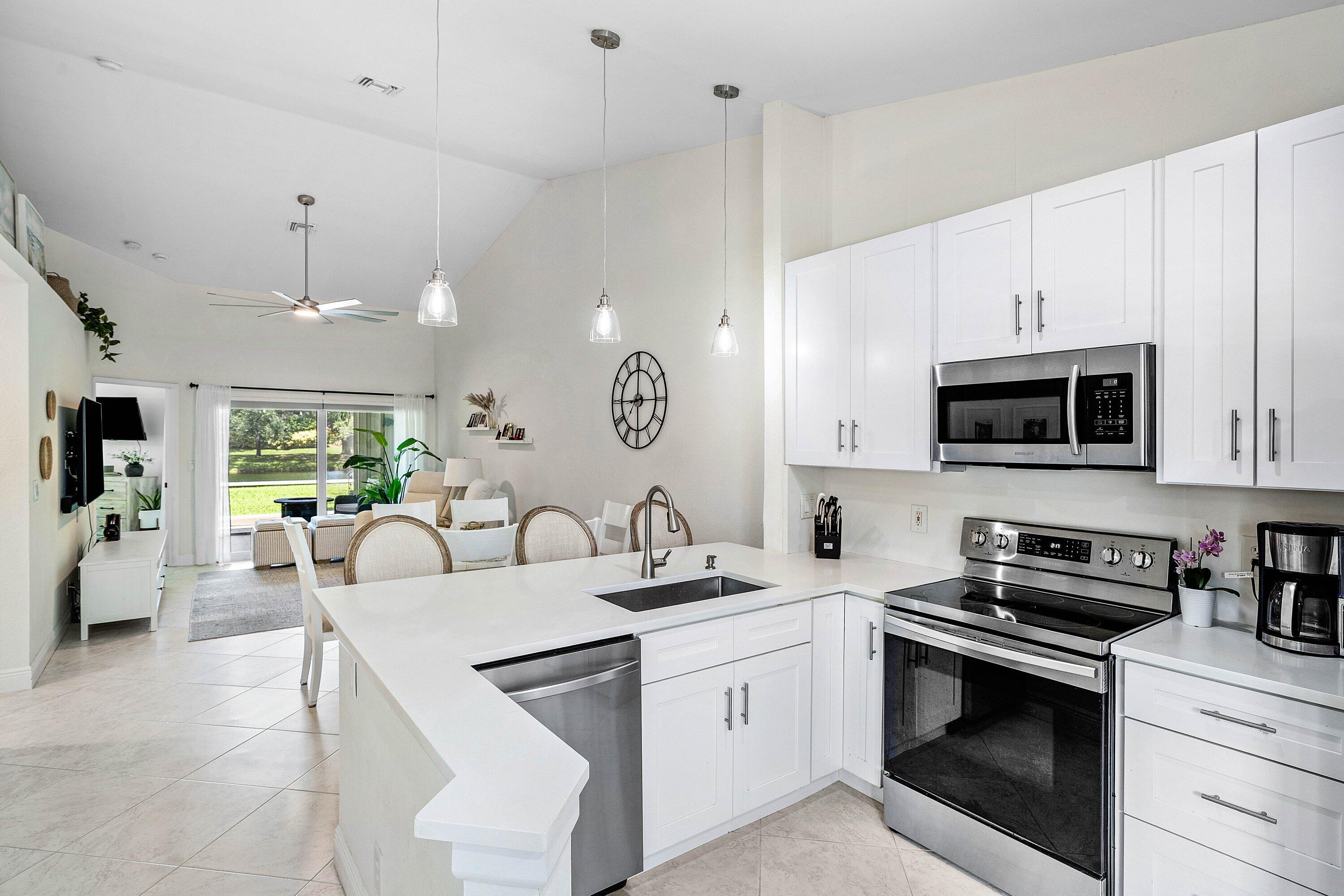 Welcome to this charming 2-bedroom, 2-bathroom villa in Waterways at Delray, offering 1,175 square feet of thoughtfully designed living space. This single-story lakeview property provides the perfect blend of comfort and convenience, with a dedicated one-car garage.  Located in Delray Beach, this villa presents an excellent opportunity to embrace waterfront living while enjoying an efficient, low-maintenance floor plan. The villa's practical layout and waterfront positioning make it an attractive choice for those seeking to experience the lifestyle that Waterways at Delray offers.    This villa also offers hurricane windows throughout, an electric vehicle class 2 charging station, cathedral ceilings, an updated kitchen, bathroom and the main bedroom has electrical room darkening shades.  All stainless steel appliances.   Make this your new Florida home!