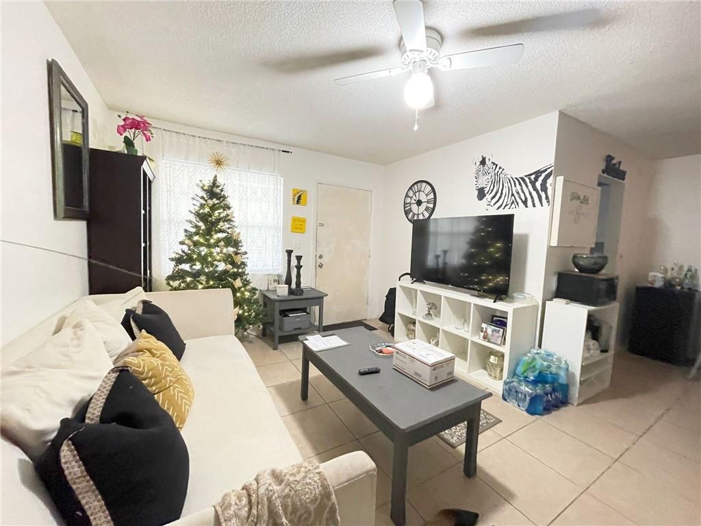 Great opportunity for investors! Currently rented for $1,075 by an excellent tenant until 02/2023. BEAUTIFUL 1 bedroom 1 bathroom unit. 1 garage space.Kitchen with granite counters, ceramic-tile floors. Pets under 40lbs allowed.  Gated community with very nice amenities and lots of green.Please see attachments prior to submitting your offer.