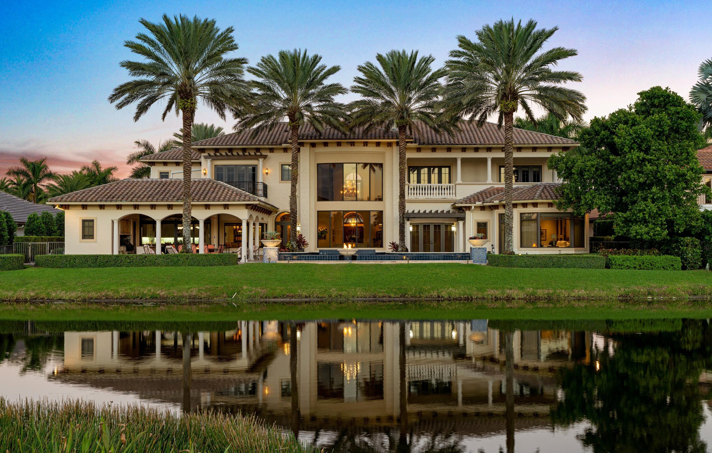 No expenses spared on this custom estate located in the prestigious St. Andrews Country Club. Built by National Custom Homes with world renown Interiors by Steven G., this pristine home was featured in Architectural Digest & is located on a coveted over-sized  lot overlooking the lake & golf course. 10,000 Sq Ft under air, each room is unique & has its own story to tell. Home has a large elevator, an upstairs/downstairs laundry room, state of the art theater w/ wet bar, leather recliners & BRAND NEW 2021 projector. Refrigerated wine cellar holds over 1,000 bottles. Recently (2021) remodeled grand kitchen & family features quartzite, Sub Zero & Wolf Appliances WOW your guests in your summer kitchen with an oversized infinity pool, mature date palms, large fire pit & whole house generator. Oversized garage doors will fit Rolls Royce, or any other large vehicle.  6 AC units, gas stove.  Control everything in the house from the TV's in each bedroom to the air conditioning, and every room light with the Crestron Smart Home System.  Kosher kitchen with two separate sinks and two separate dishwashers. Two laundry rooms - one on each floor. Furniture is negotiable.  Fixtures excluded from sale are, master bathroom; chandelier, dining room; chandelier, sconces, stain-glass windows and hallway; ram horns.
