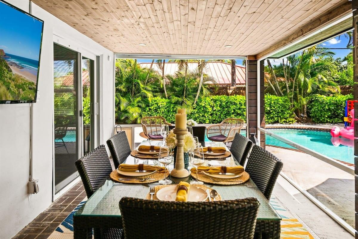 Beautiful 4/3 tropical paradise, fully remodeled - a rare find in the lovely Bel Air neighborhood.  Walking distance to the beach, Intracoastal Waterway and quaint Lauderdale-by-the-Sea retail district with great restaurants, night life and shopping!   This remodel includes impact doors and windows, quartz countertops, new appliances, new flooring, new a/c, all 3 bathrooms completely remodeled down to the plumbing & new garage door.  New fencing installed around backyard, new decking.