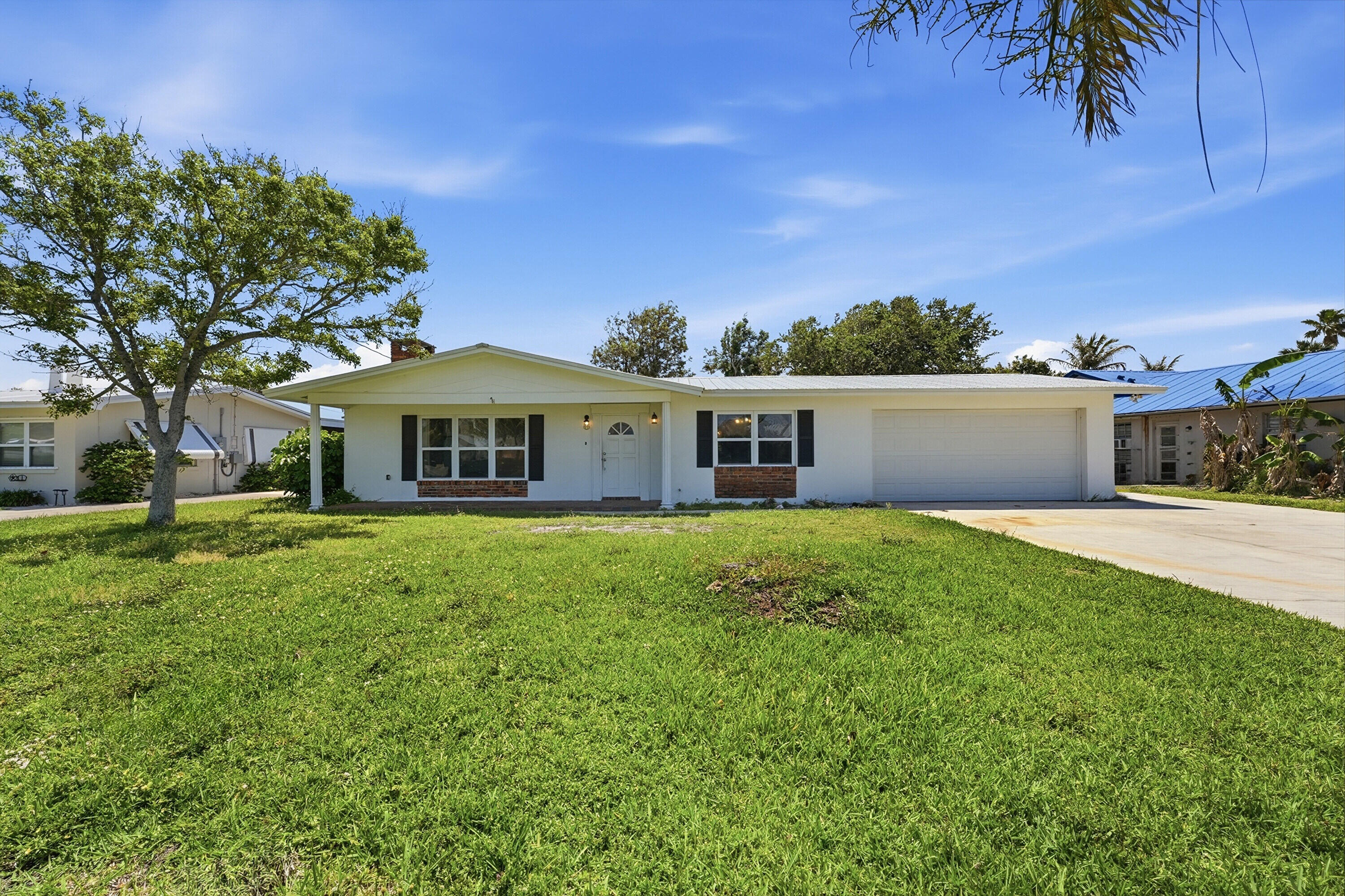 Rare opportunity to own a charming island home just a short walk to Jaycee Park and South Beach Park, offering the perfect chance to enjoy the coastal lifestyle. Ideally located near beautiful beaches, parks, and all the island has to offer, this property combines convenience with relaxed Florida living. Inside, you will find an enclosed sunroom that provides additional living space perfect for relaxing or entertaining. The home also features an attached workshop, ideal for hobbies, storage, or projects, along with an extra detached shed for even more versatility. Whether you are looking for a primary residence, seasonal retreat, or investment opportunity, this island property offers endless potential in a highly desirable location.