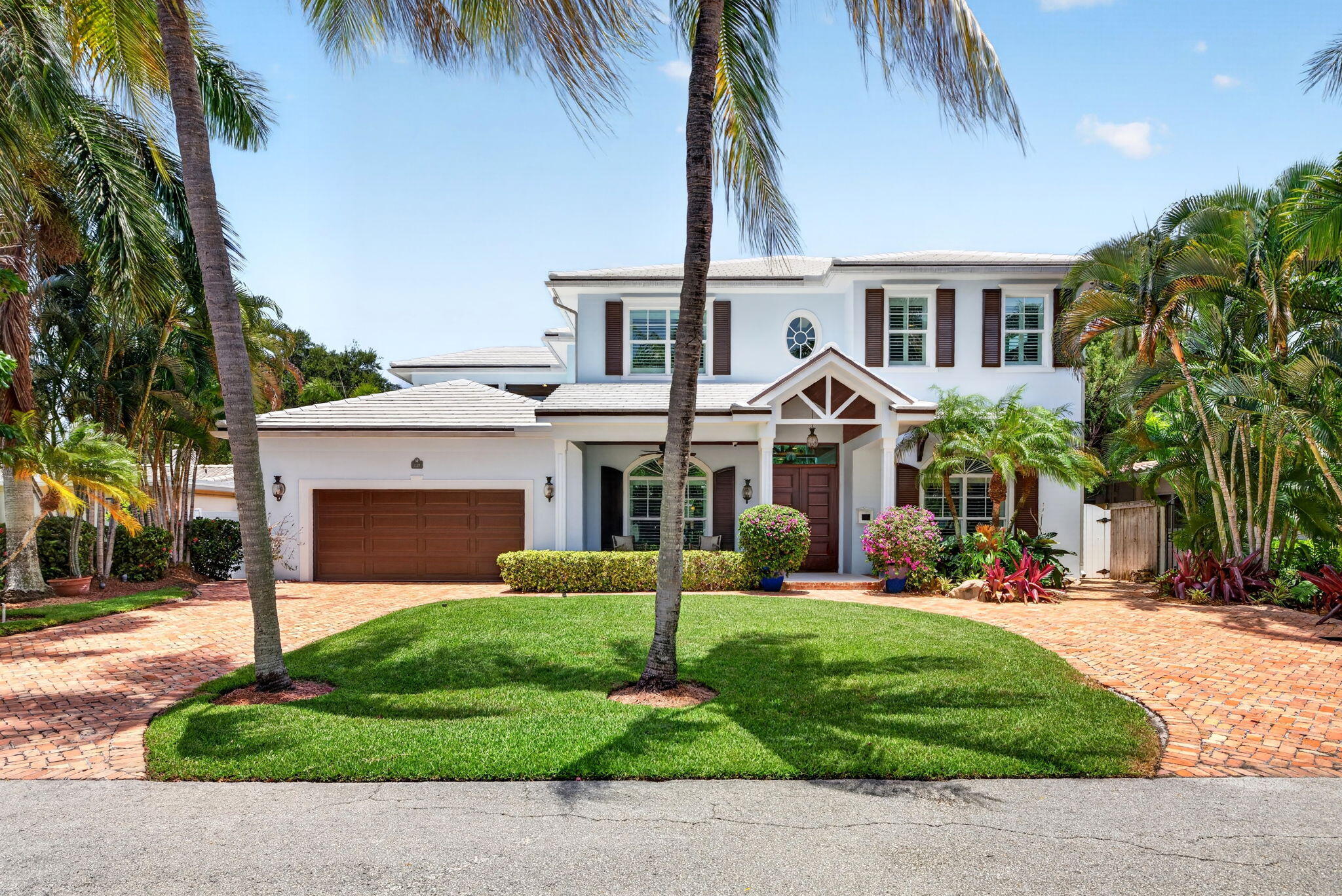 A truly rare opportunity in Lauderdale Harbors, this exceptional offering includes two adjacent residences totaling more than 5,500 square feet of living space. Whether envisioned as a private two-home estate, multigenerational retreat, or luxury residence with a separate guest house, the possibilities are difficult to replicate. The custom-built British West Indies home at 1329 SE 13th Terrace pairs timeless craftsmanship with resort-style amenities, while the beautifully updated Florida Ranch at 1318 SE 12th Way offers privacy, flexibility, and views overlooking Cliff Lake Nature Preserve. Together, they create one of Fort Lauderdale's most distinctive residential opportunities.