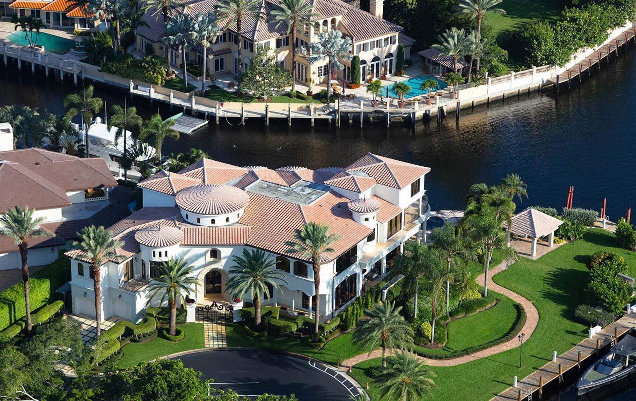 This Sanctuary Deepwater showplace is sited on 116 +/- feet of prime waterfrontage overlooking the Intracoastal constructed by Cudmore Builders and award-winning Affiniti Architects. Dramatically scaled for a major art collection. Enjoy window walls of glass, sleek marble floors, grand salon with soaring fireplace, trophy room, elegant dining room, wine room, club room with theater room. Enjoy a sleek modern kitchen with adjacent waterfront family and breakfast rooms. Luxurious Primary Suite and professional fitness room facing the Intracoastal. A 3rd level private office with waterway views. Resort-style infinity pool. Exclusions: Antique Cabinet by stairway, Piano, Billiard Table & Victrola, dining room Bronze Statue, Antique Mirror & Shelf by elevator, all Artwork & Decorative Items. DISCLAIMER: Information published or otherwise provided by the listing company and its representatives including but not limited to prices, measurements, square footages, lot sizes, calculations, statistics, and videos are deemed reliable but are not guaranteed and are subject to errors, omissions or changes without notice. All such information should be independently verified by any prospective purchaser or seller. Parties should perform their own due diligence to verify such information prior to a sale or listing. Listing company expressly disclaims any warranty or representation regarding such information. Prices published are either list price, sold price, and/or last asking price. The listing company participates in the Multiple Listing Service and IDX. The properties published as listed and sold are not necessarily exclusive to listing company and may be listed or have sold with other members of the Multiple Listing Service. Transactions where listing company represented both buyers and sellers are calculated as two sales. Some affiliations may not be applicable to certain geographic areas. If your property is currently listed with another broker, please disregard any solicitation for services. Information published or otherwise provided by seller, listing company or its representatives is deemed reliable but are not guaranteed and subject to errors, omissions, or changes without notice. Copyright 2025 by the listing company. All Rights Reserved.