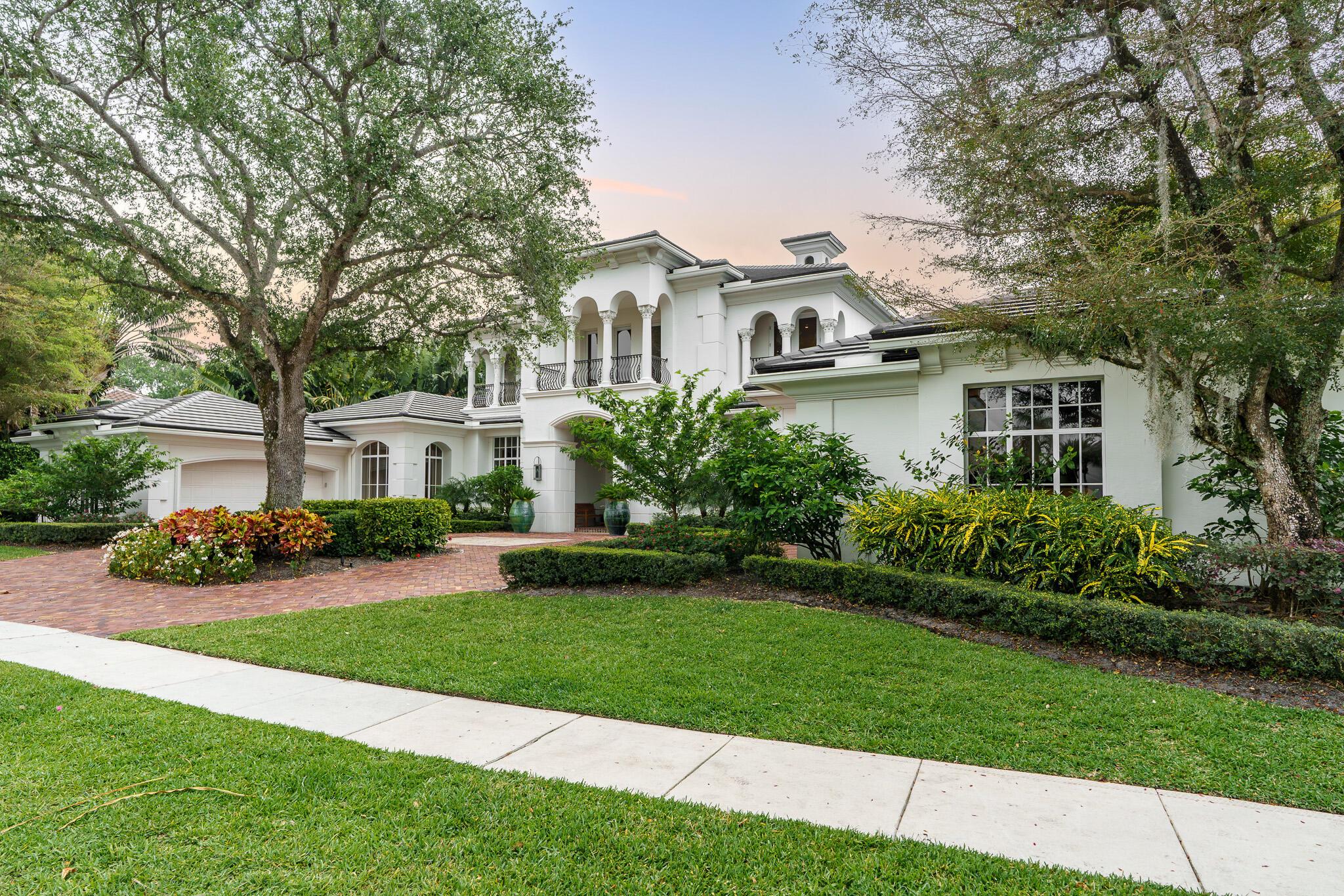 Full Golf Membership, magnificent Estate home located in the prestigious community of Isla Verde in Addison Reserve Country Club.  8411 sq ft under air, 7 bedrooms, 9 1/2 baths featuring a 4 car garage plus a separate Golf Cart garage.  New flat tile roof and Solar Panels have been installed in 2024. This rare to market home has incredible long lake and golf course views, a brand new pool & marble patio area complete with an oversized spa, cascading waterfall, and a natural gas powered heater.  There is a full outdoor dining area complete with a top of the line grill & appliances, & a newly added remote powered screen system.  The interior has tastefully been renovated complete with a brand new Onyx bar, new flooring, newly renovated guest bathrooms & so much more!
