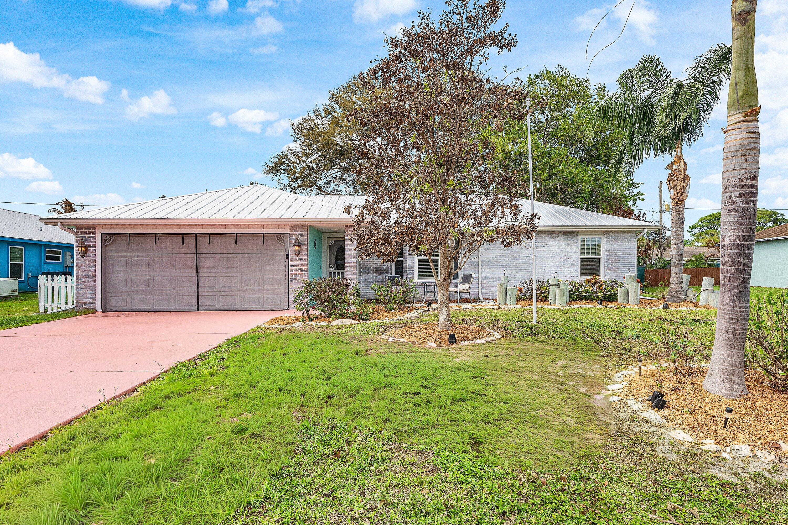 This beautifully remodeled house is ready for you to call it HOME! All of the big-ticket items are already taken care of, so you just have to bring your personal items and move in! New Metal Roof installed in 2022, A/C 2021, Hot Water Heater 2021, Brand New Duct Work 2025 and Newer Windows (partially impact) to put your mind at ease! Beautiful, Neutral plank tile throughout, White cabinets in the kitchen with crown molding and newer fridge and microwave. Your private backyard with mature trees and an above ground pool with deck and child lock are waiting for you to sit and relax and enjoy some tranquility. This home has everything you need and more!